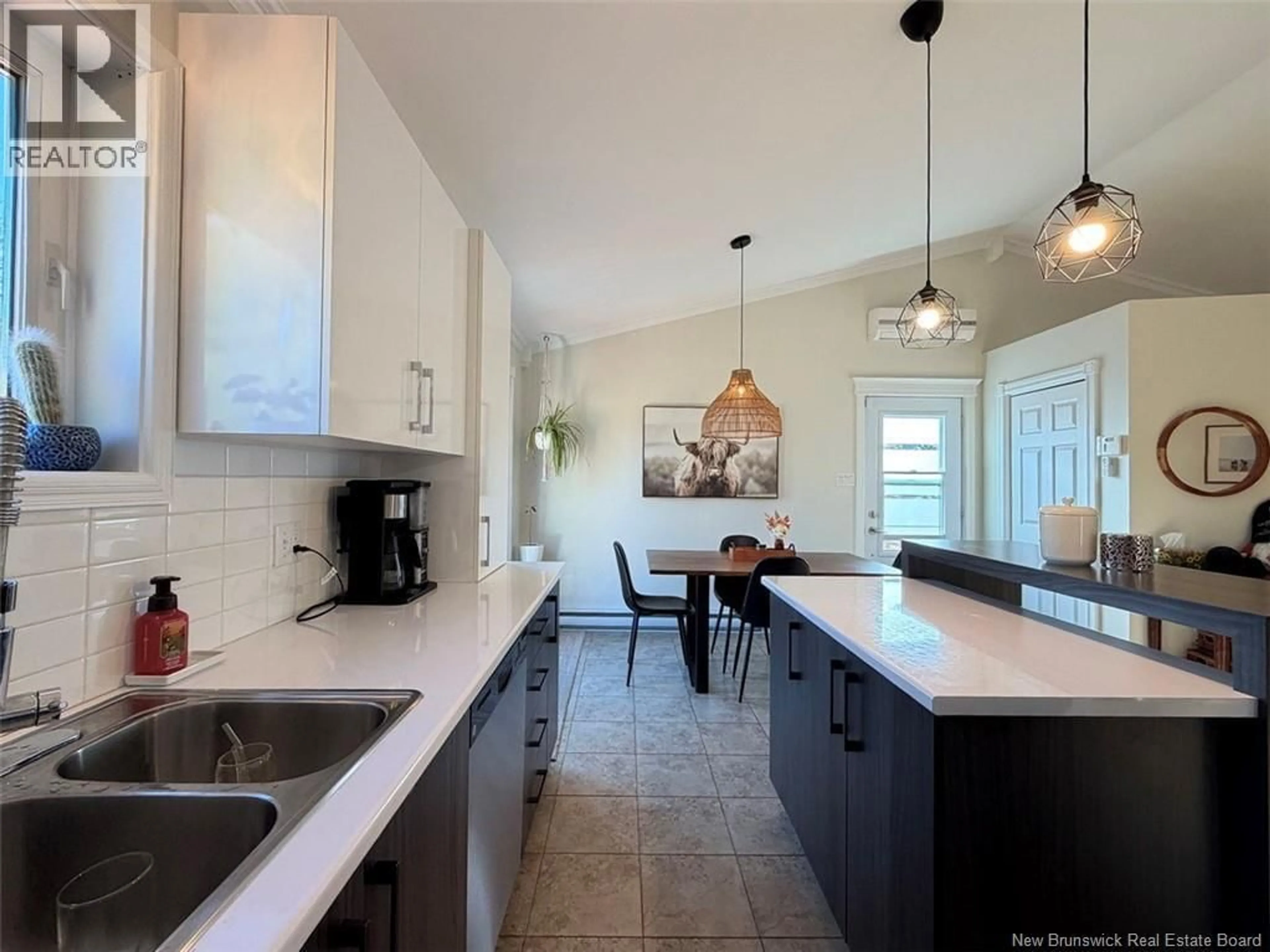 Open concept kitchen, ceramic/tile floor for 97 OLIVIER BOUCHER ROAD, Edmundston New Brunswick E3V4X1