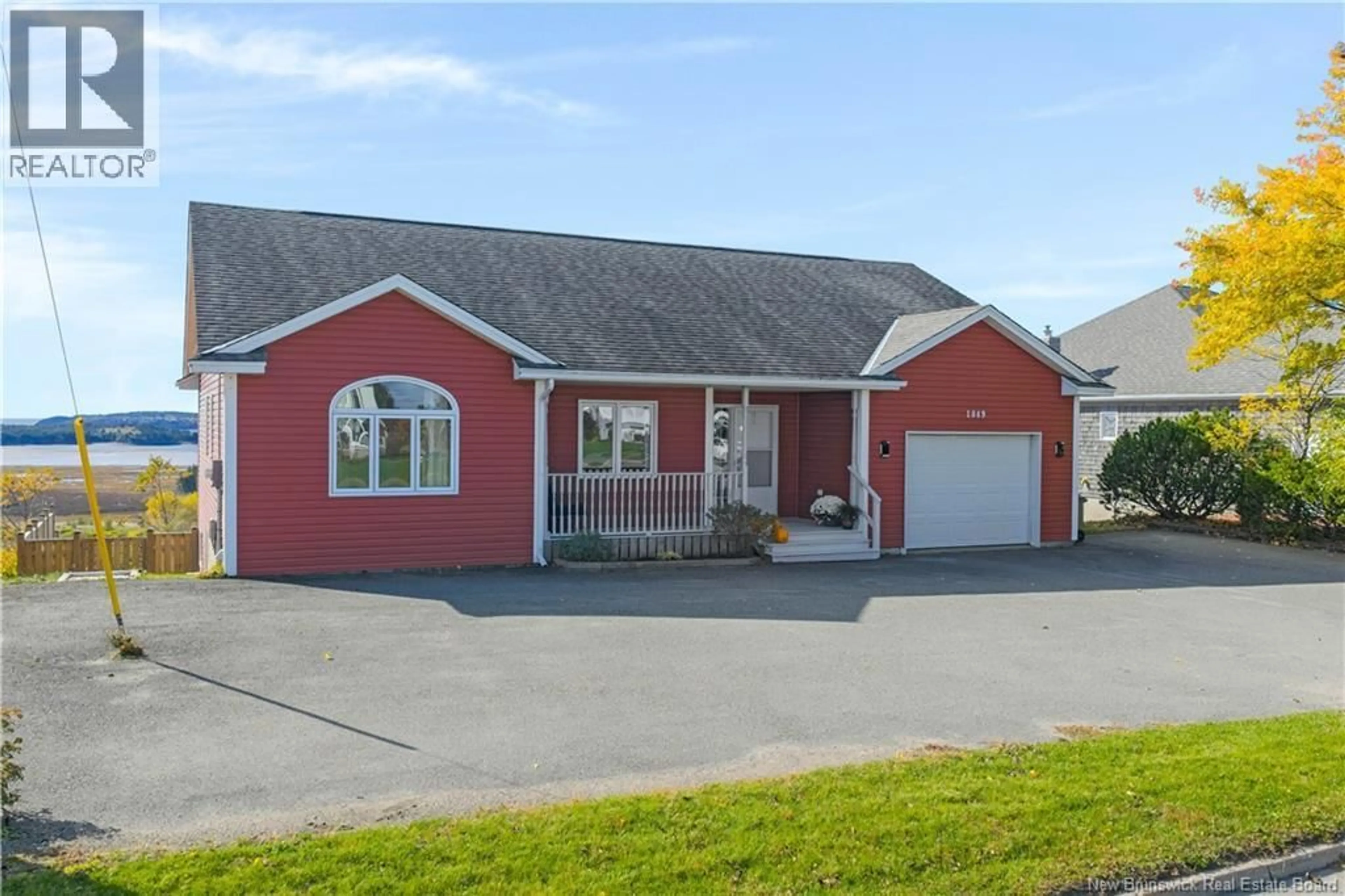 Home with vinyl exterior material, street for 1849 MANAWAGONISH ROAD, Saint John New Brunswick E2M3R9