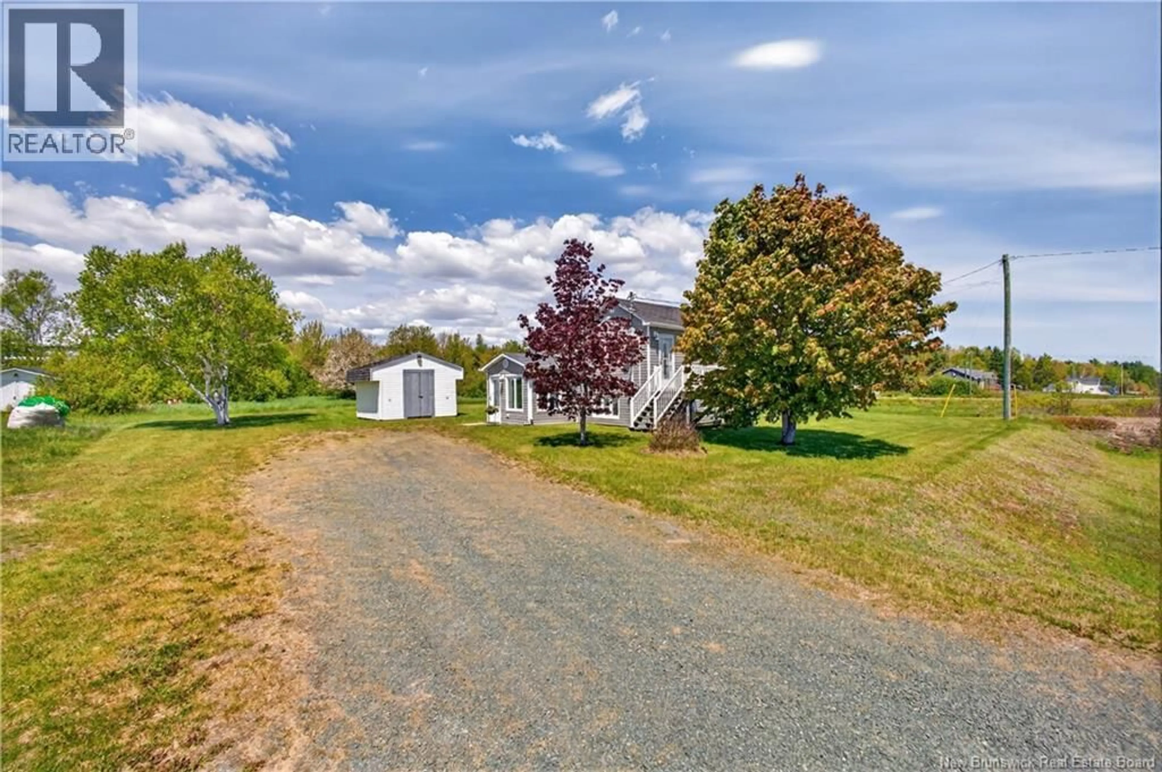 A pic from outside/outdoor area/front of a property/back of a property/a pic from drone, street for 517 ROUTE 11 HWY, Lower Newcastle New Brunswick E1V7G2