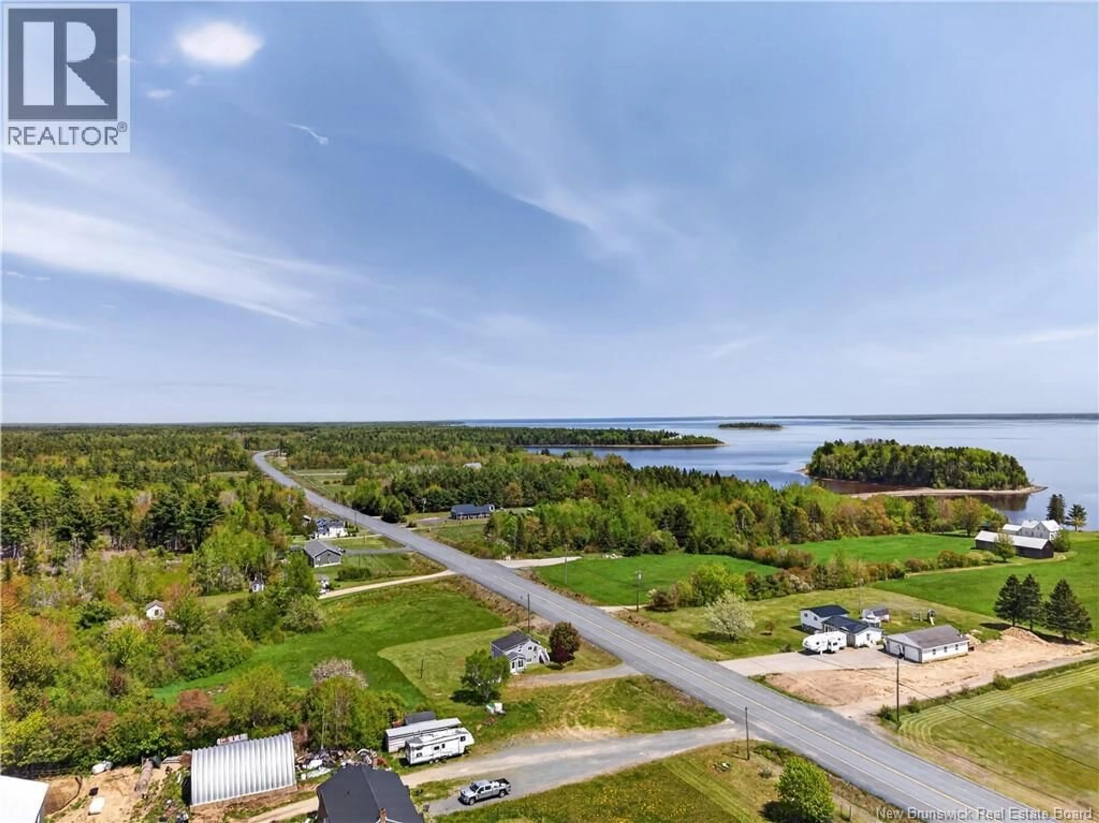 A pic from outside/outdoor area/front of a property/back of a property/a pic from drone, water/lake/river/ocean view for 517 ROUTE 11 HWY, Lower Newcastle New Brunswick E1V7G2
