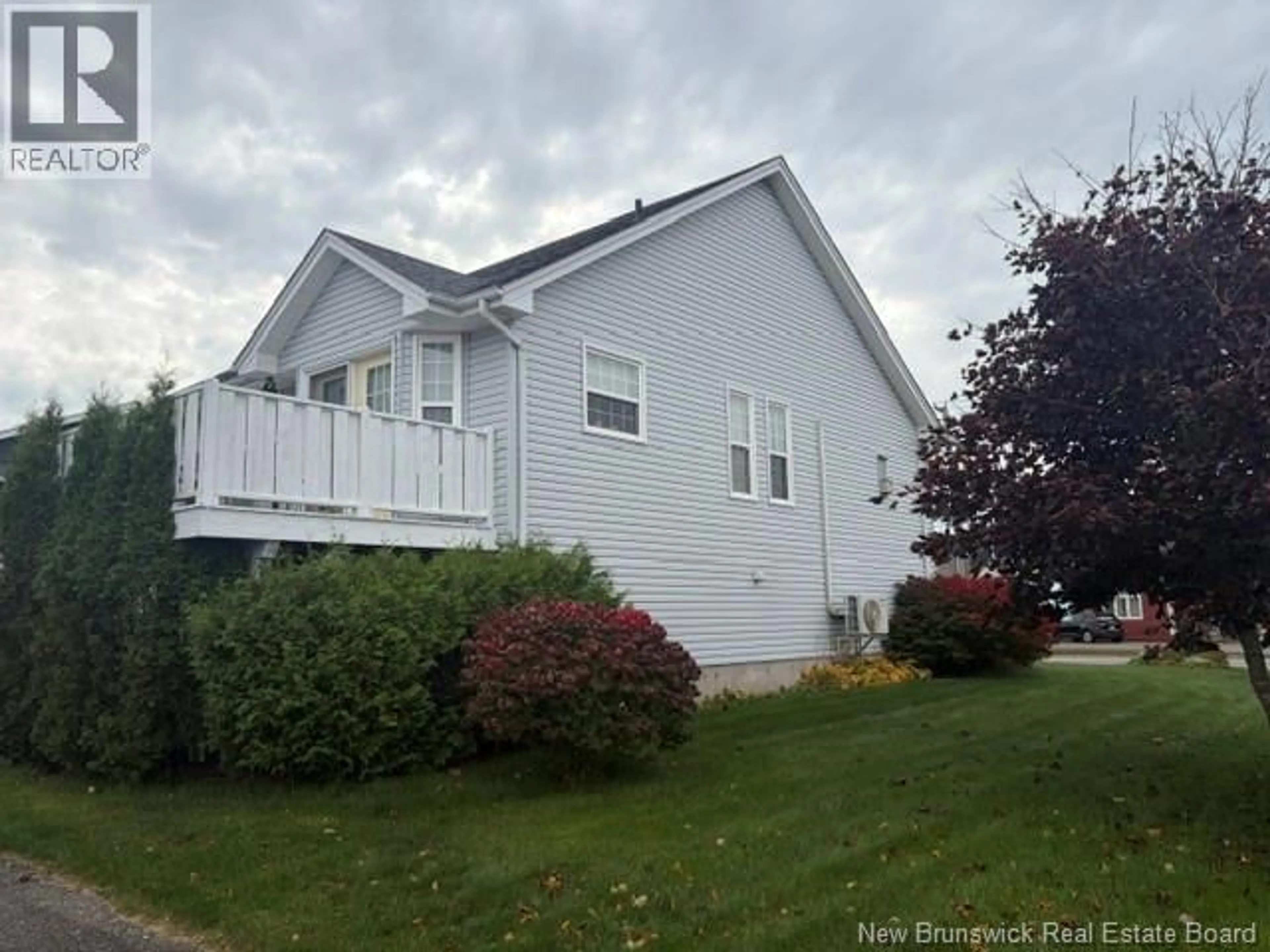 Home with vinyl exterior material, street for 1852 MANAWAGONISH ROAD, Saint John New Brunswick E2M3Y5