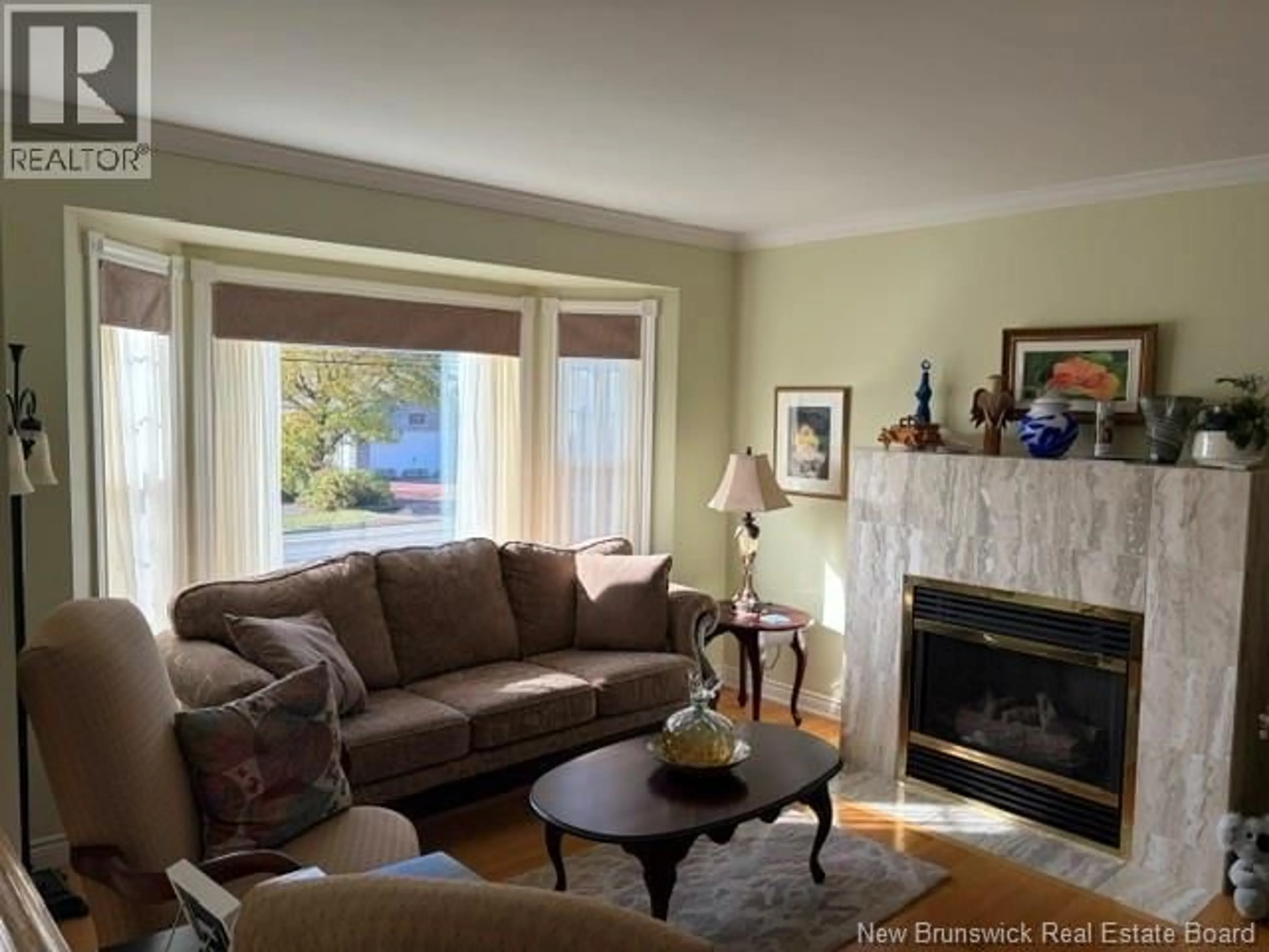 Living room with furniture, wood/laminate floor for 1852 MANAWAGONISH ROAD, Saint John New Brunswick E2M3Y5