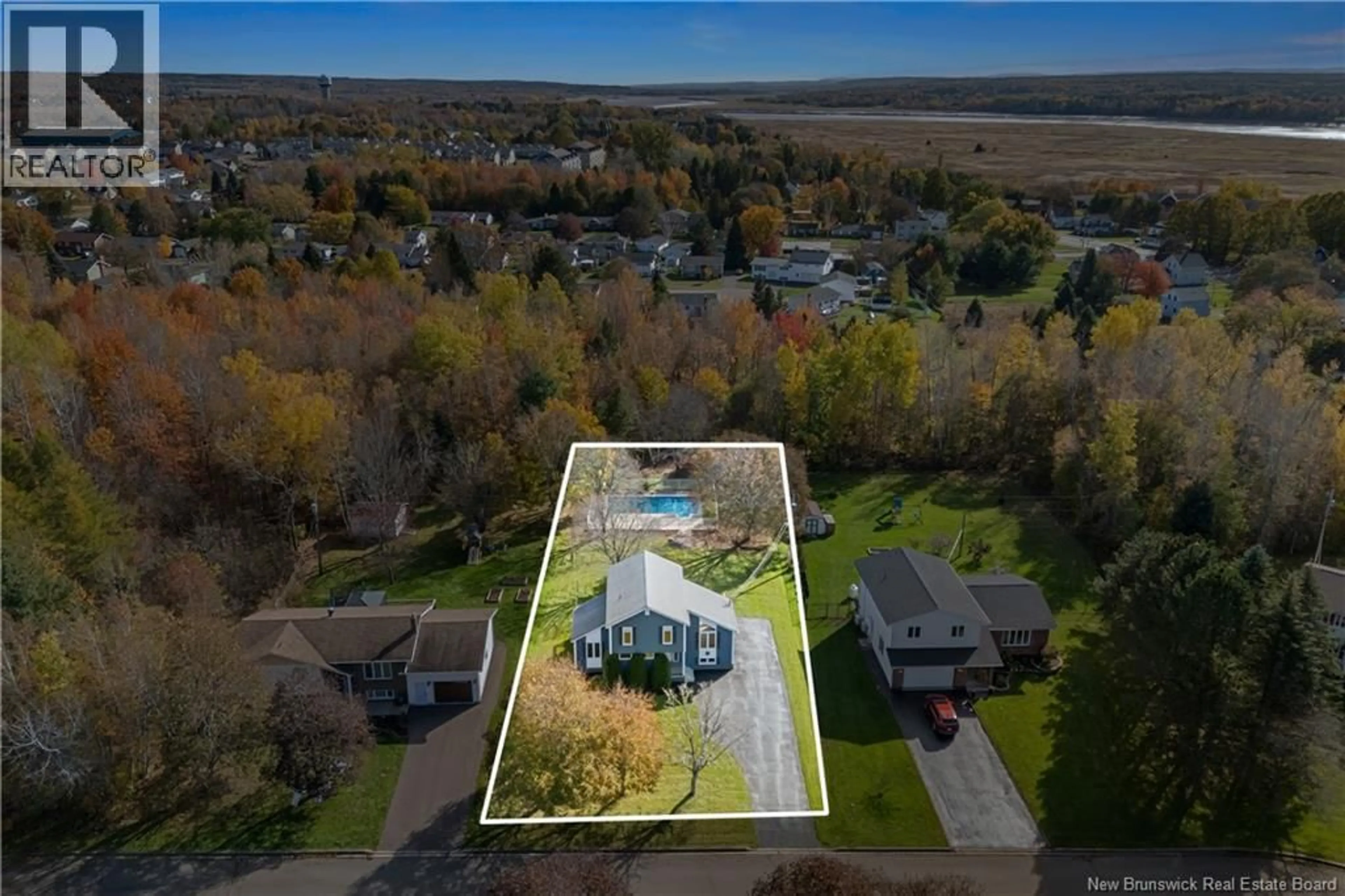 A pic from outside/outdoor area/front of a property/back of a property/a pic from drone, water/lake/river/ocean view for 591 LAFLEUR, Dieppe New Brunswick E1A6A3