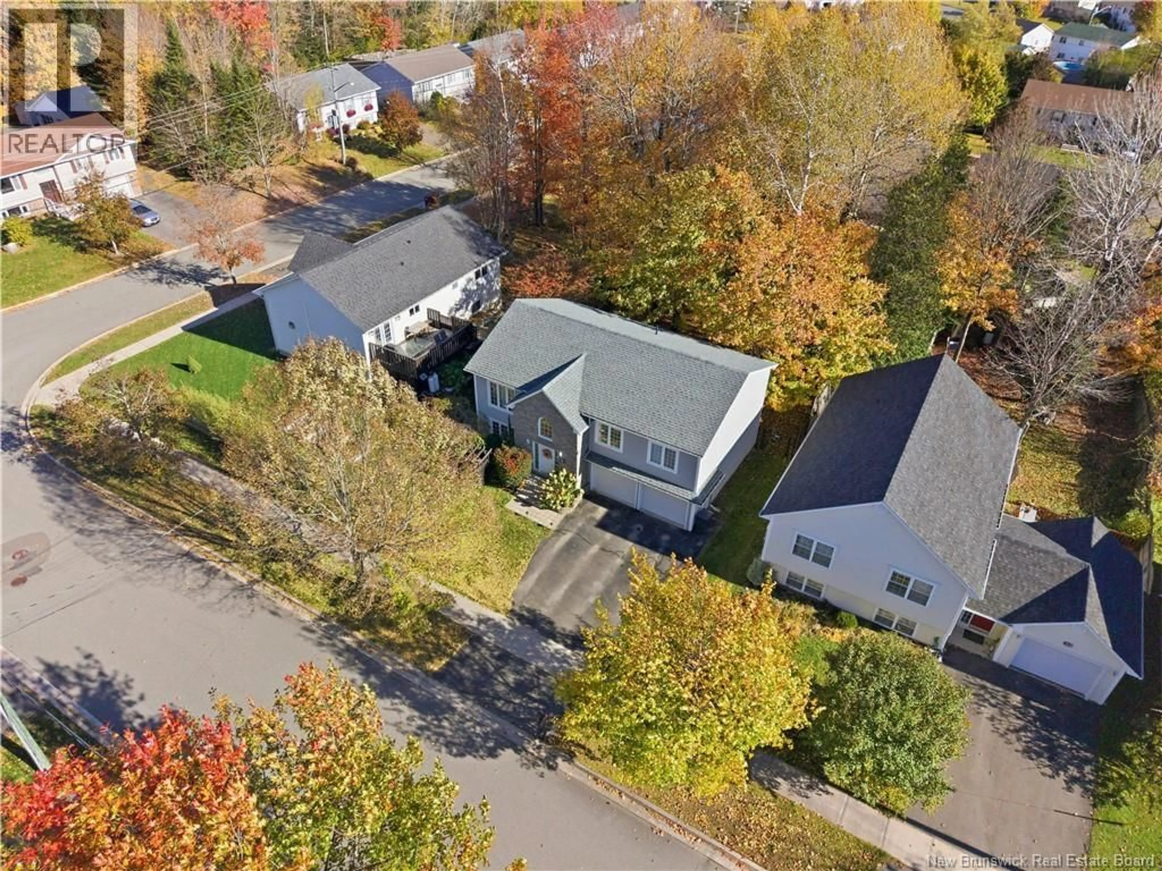 A pic from outside/outdoor area/front of a property/back of a property/a pic from drone, street for 14 WILFRED AVENUE, Fredericton New Brunswick E3B9S1