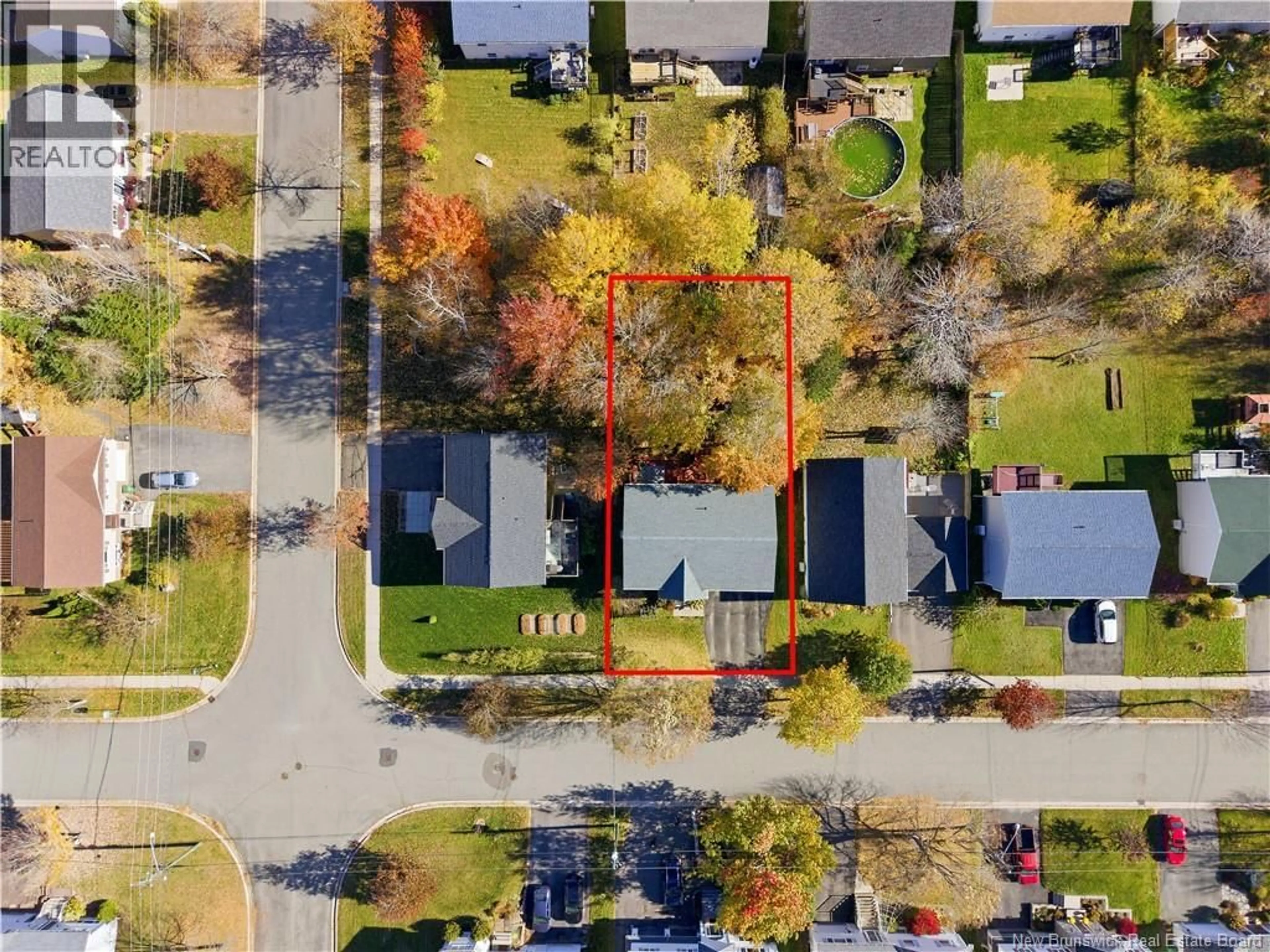 A pic from outside/outdoor area/front of a property/back of a property/a pic from drone, street for 14 WILFRED AVENUE, Fredericton New Brunswick E3B9S1