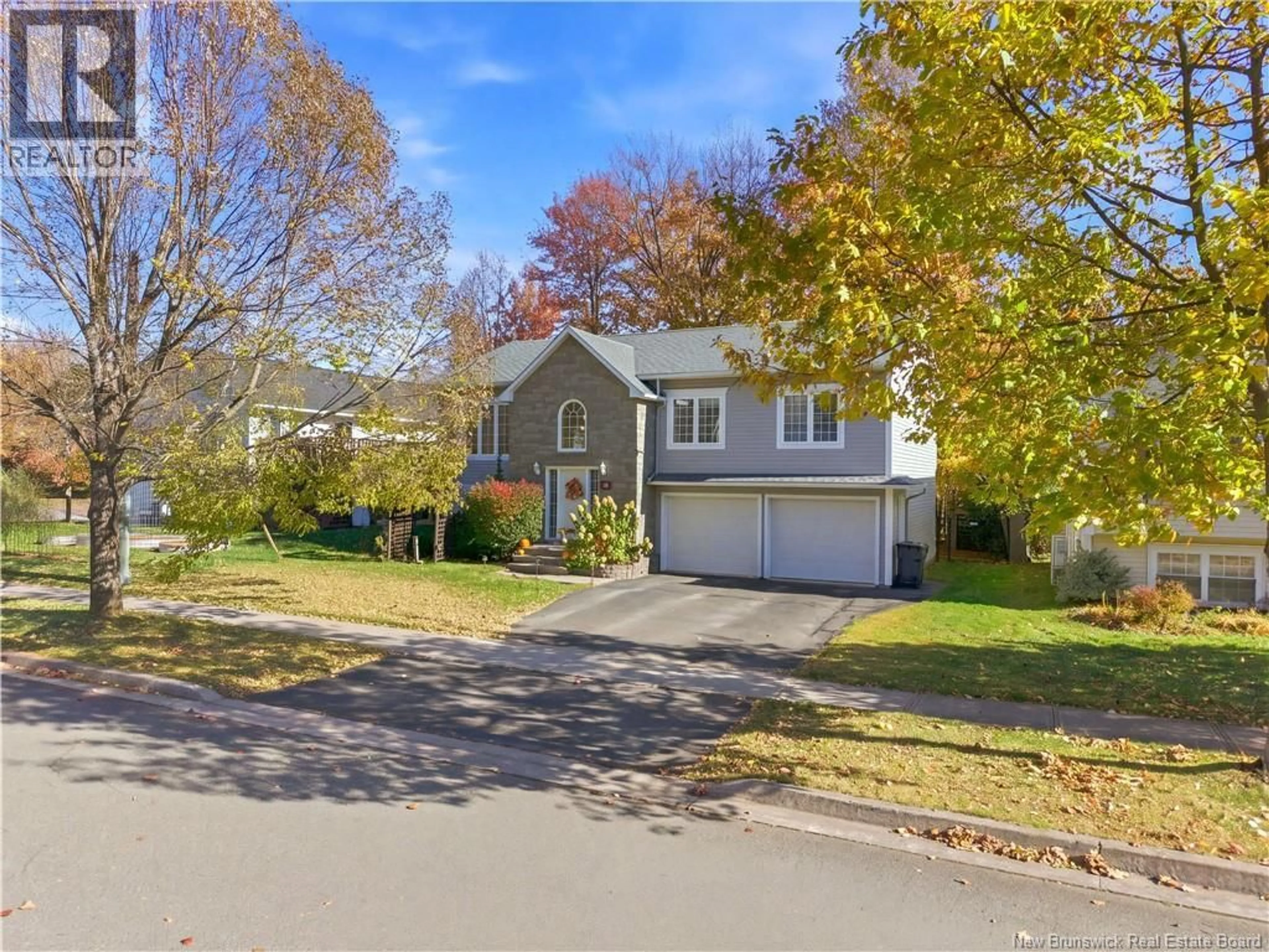A pic from outside/outdoor area/front of a property/back of a property/a pic from drone, street for 14 WILFRED AVENUE, Fredericton New Brunswick E3B9S1