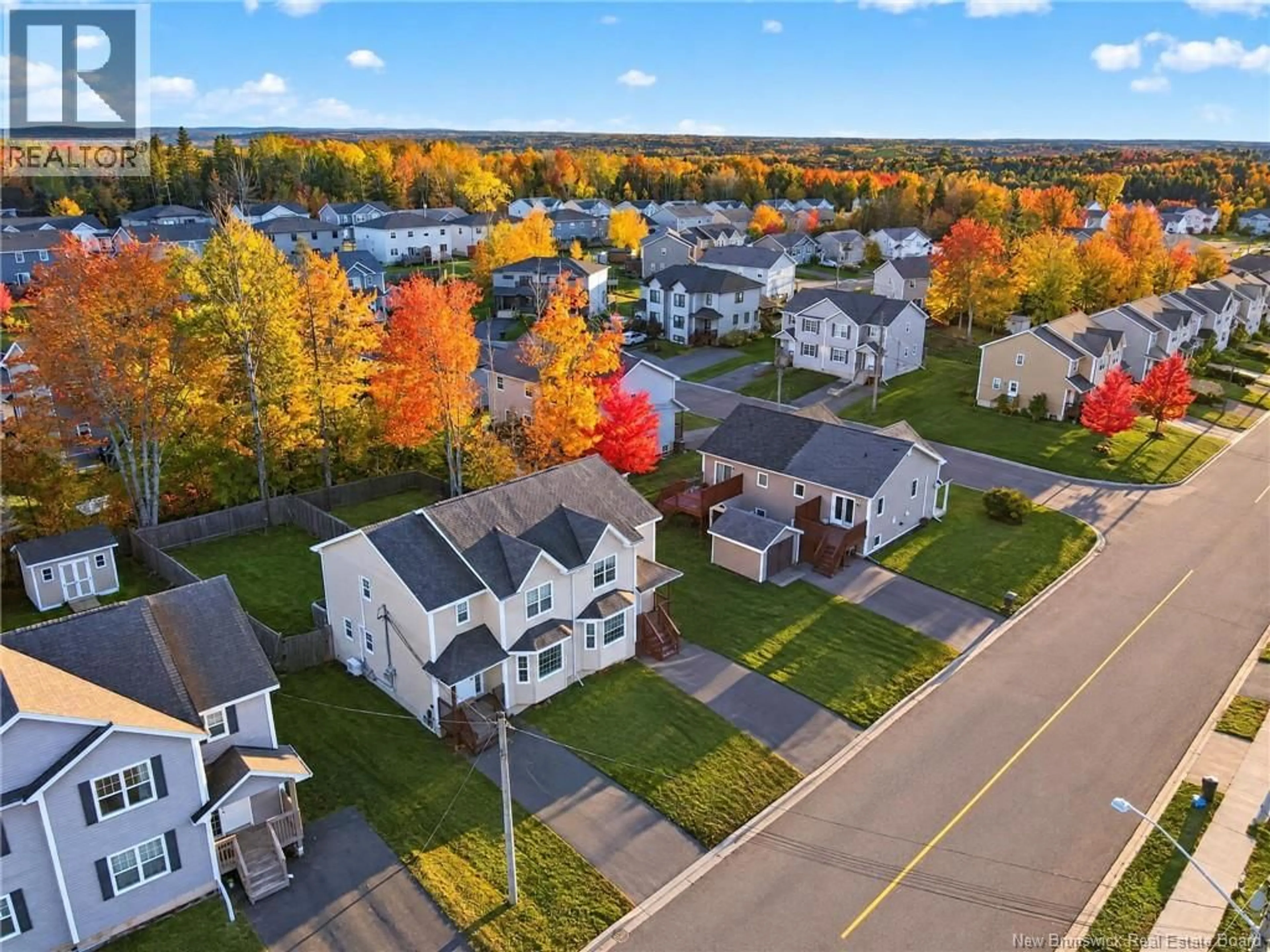 A pic from outside/outdoor area/front of a property/back of a property/a pic from drone, street for 183 BELLE FORET, Dieppe New Brunswick E1A9E6
