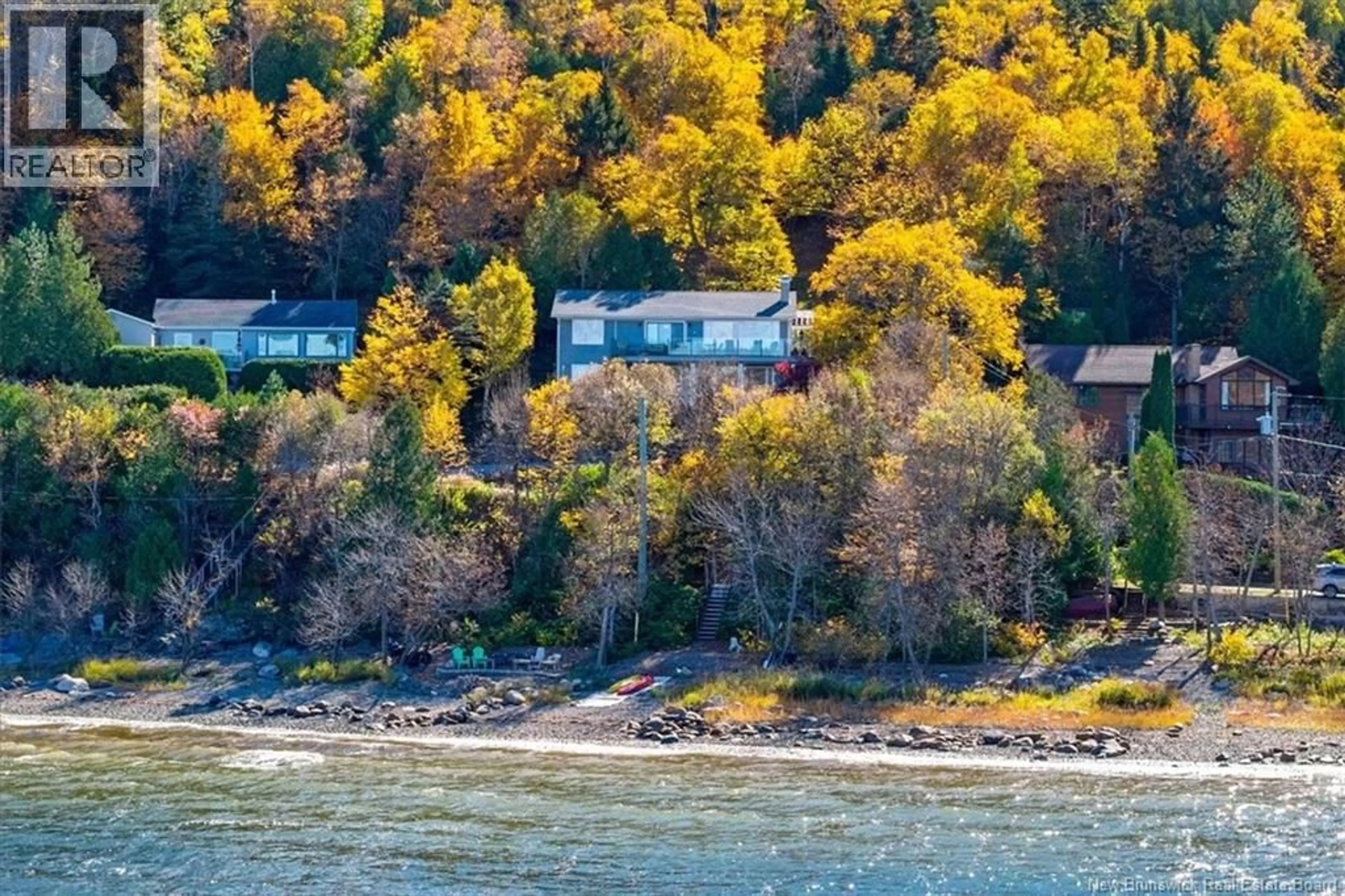A pic from outside/outdoor area/front of a property/back of a property/a pic from drone, water/lake/river/ocean view for 50 BEACH ROAD, Saint John New Brunswick E2K5H5