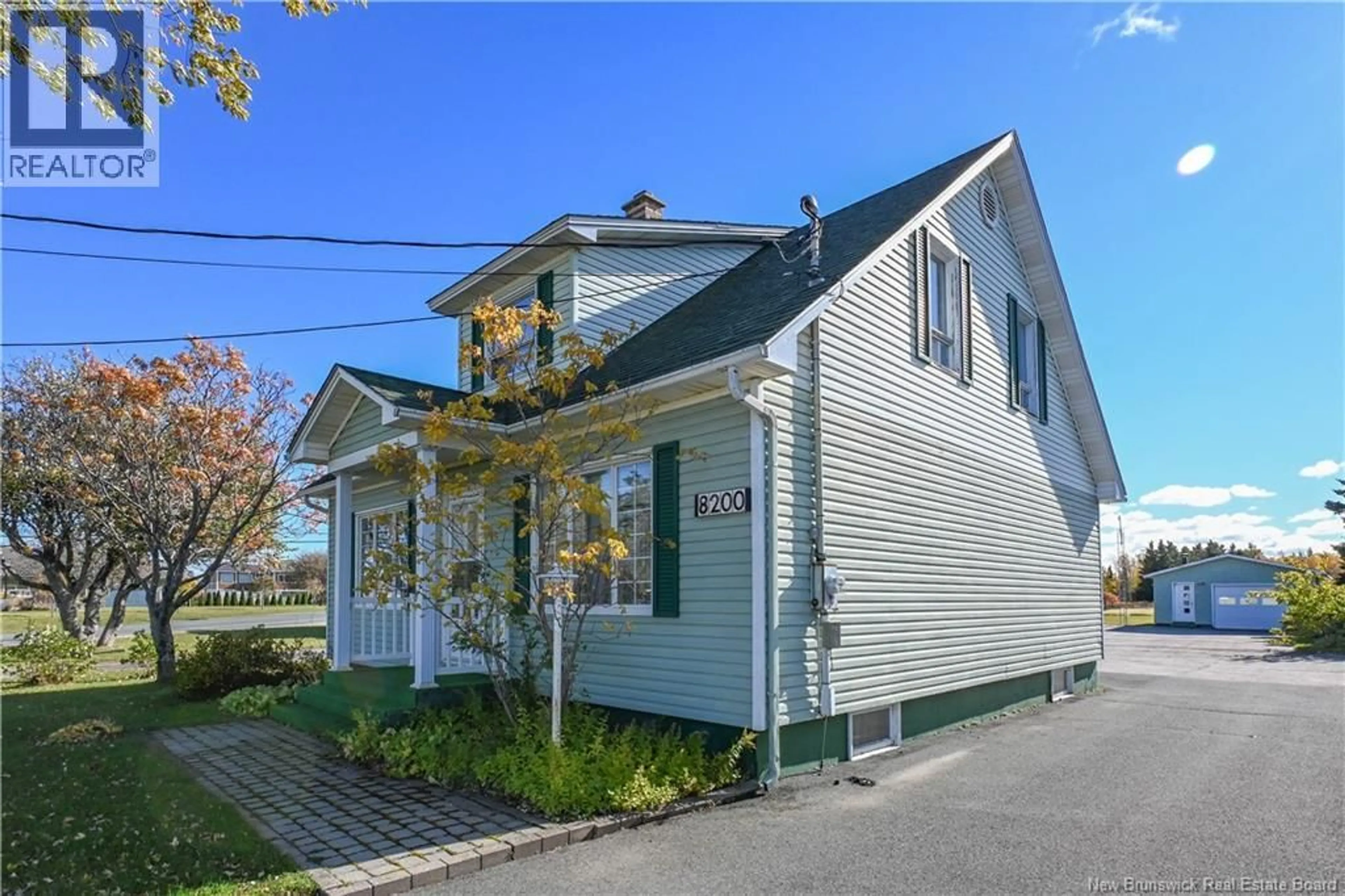 Home with vinyl exterior material, street for 8200 SAINT-PAUL STREET, Bas-Caraquet New Brunswick E1W6E1