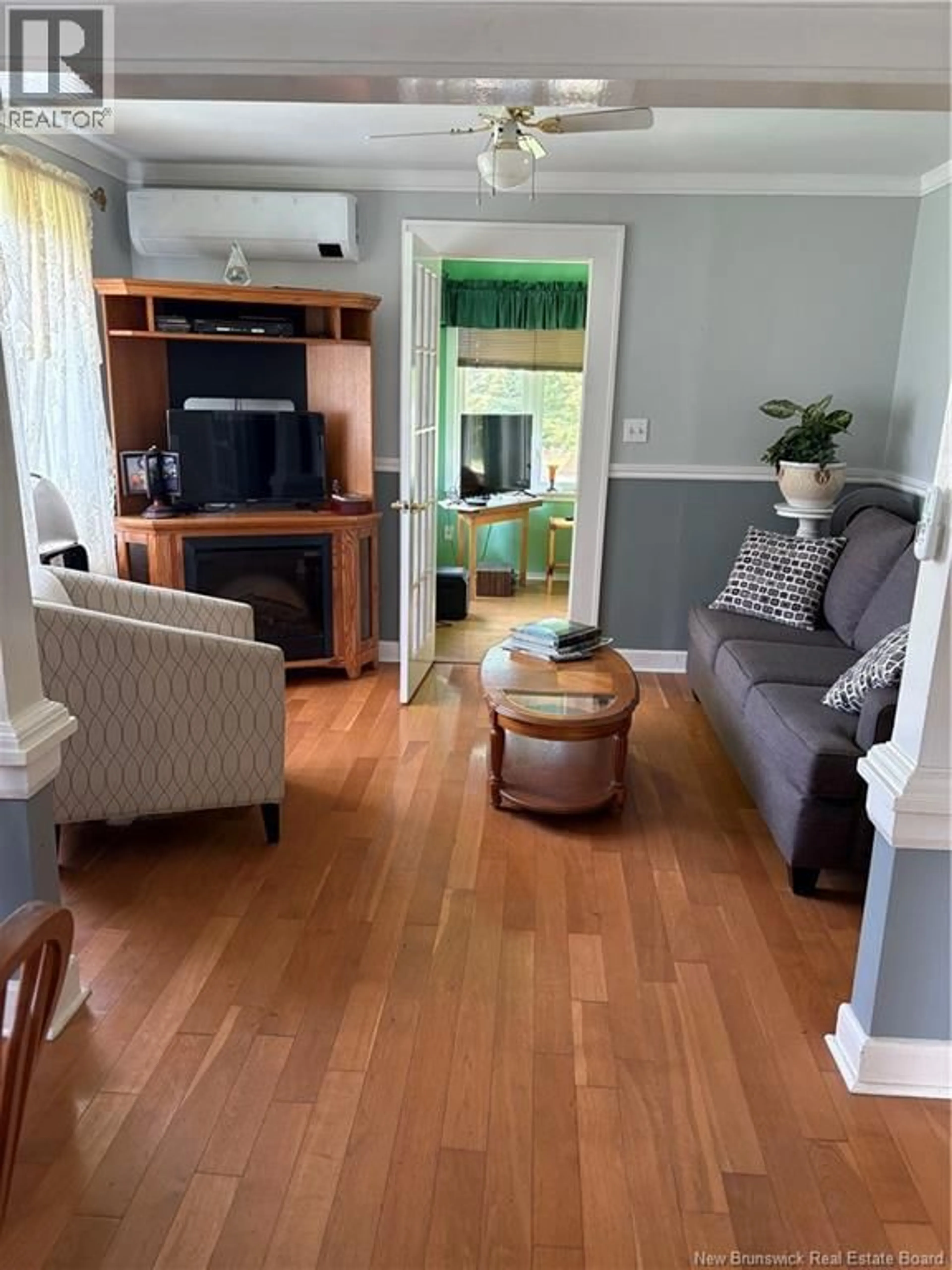 Living room with furniture, wood/laminate floor for 179 LEBLANC AVENUE, Shediac New Brunswick E4P1Y6