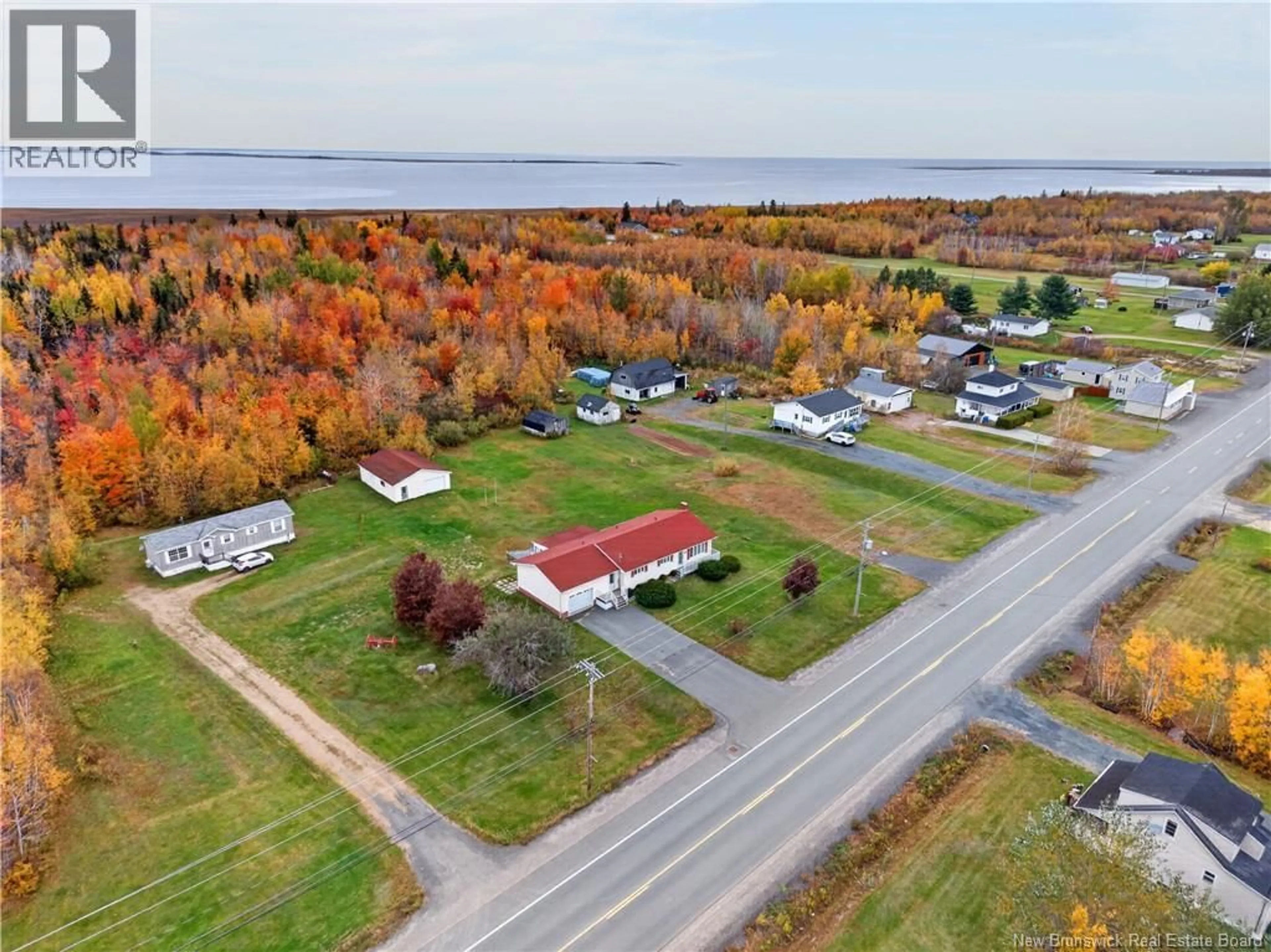 A pic from outside/outdoor area/front of a property/back of a property/a pic from drone, water/lake/river/ocean view for 5430 ROUTE 117, Baie-Sainte-Anne New Brunswick E9A1E7