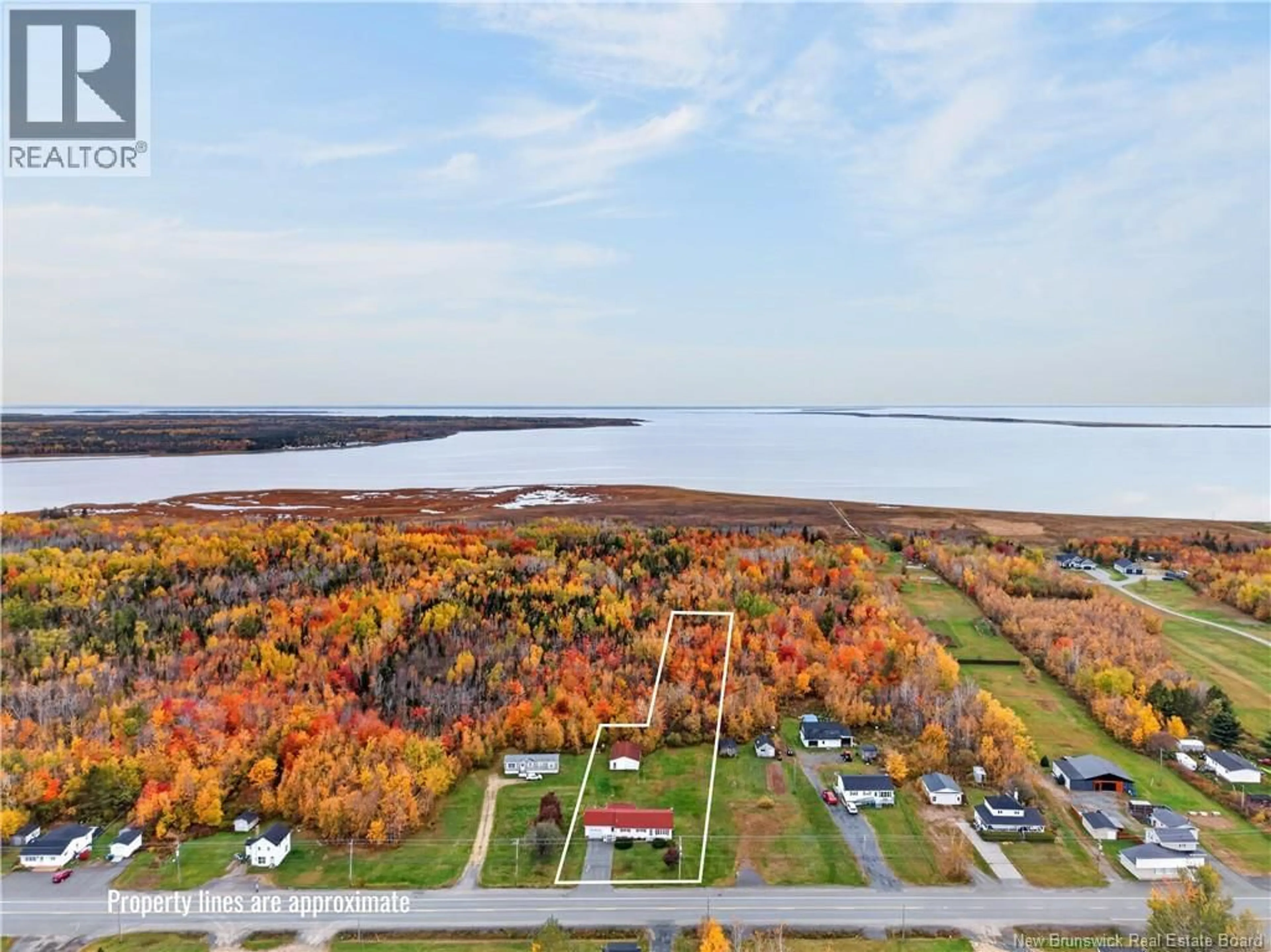 A pic from outside/outdoor area/front of a property/back of a property/a pic from drone, water/lake/river/ocean view for 5430 ROUTE 117, Baie-Sainte-Anne New Brunswick E9A1E7