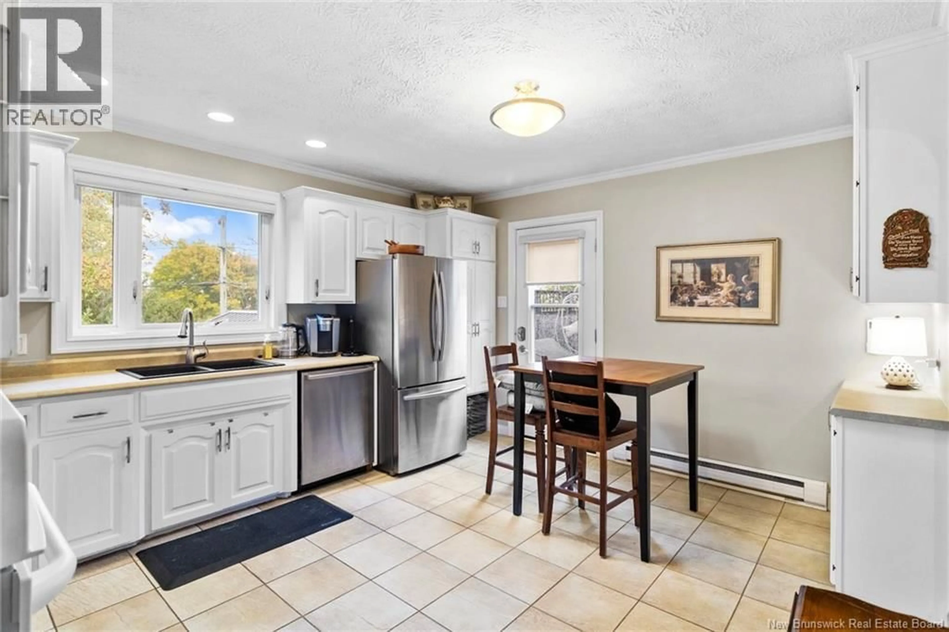 Open concept kitchen, ceramic/tile floor for 230 CASE STREET, Fredericton New Brunswick E3B4X2