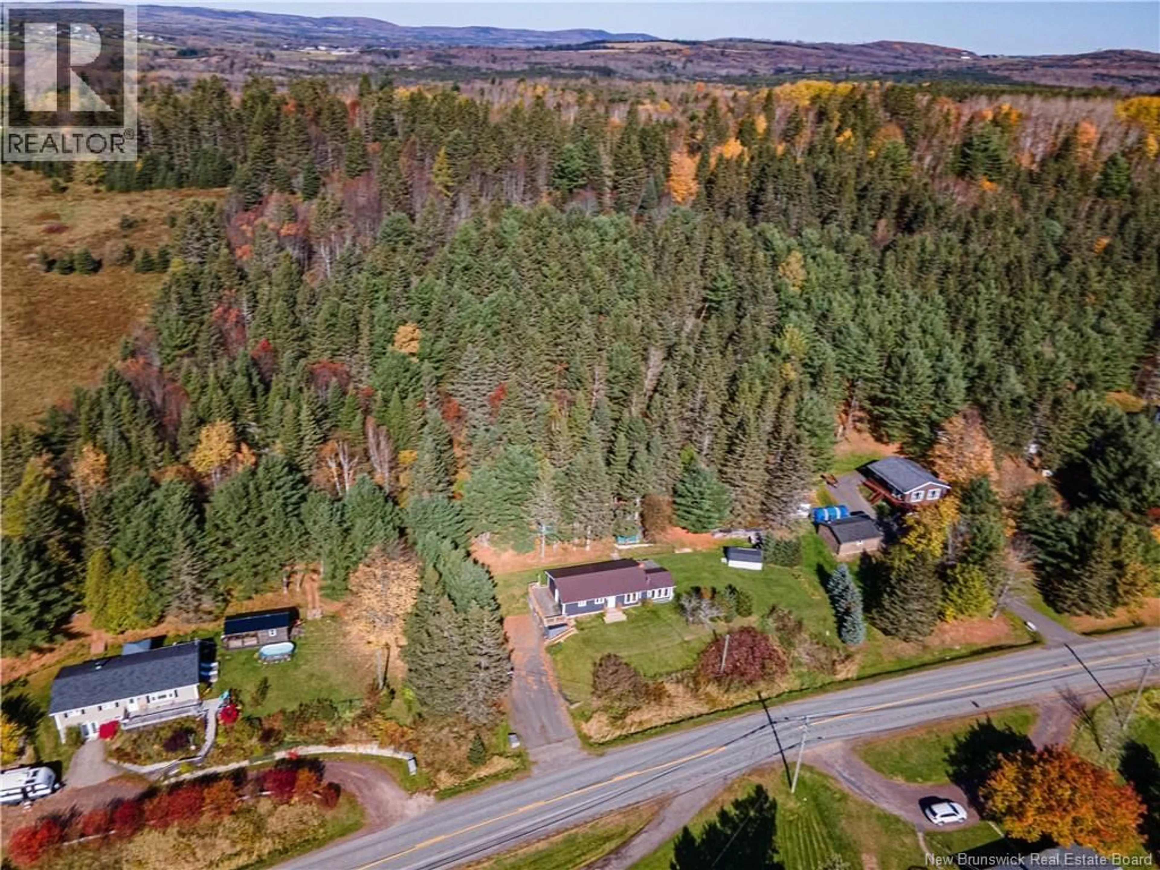 A pic from outside/outdoor area/front of a property/back of a property/a pic from drone, forest/trees view for 3119 ROUTE 121, Apohaqui New Brunswick E5P3V3