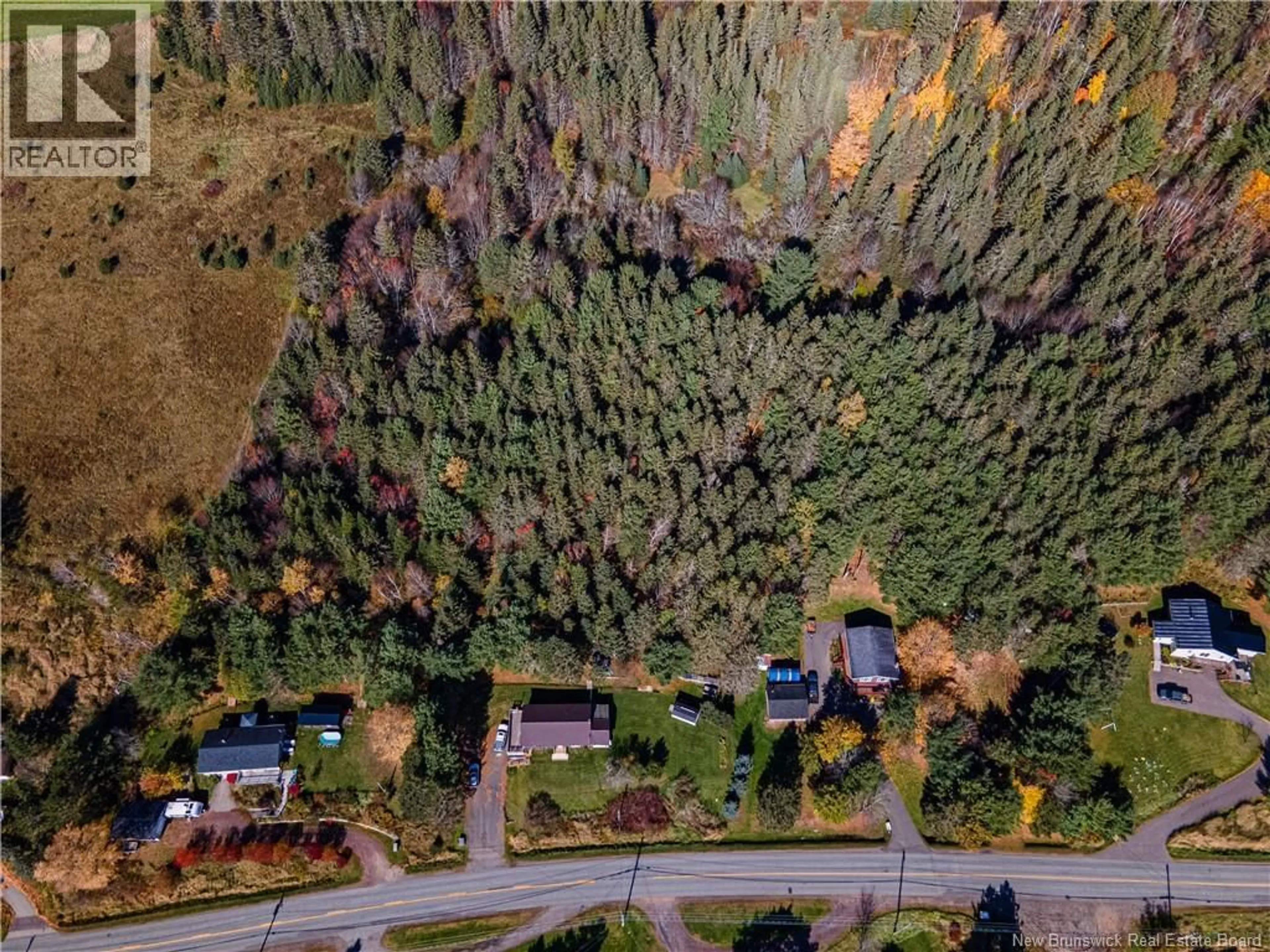 A pic from outside/outdoor area/front of a property/back of a property/a pic from drone, forest/trees view for 3119 ROUTE 121, Apohaqui New Brunswick E5P3V3