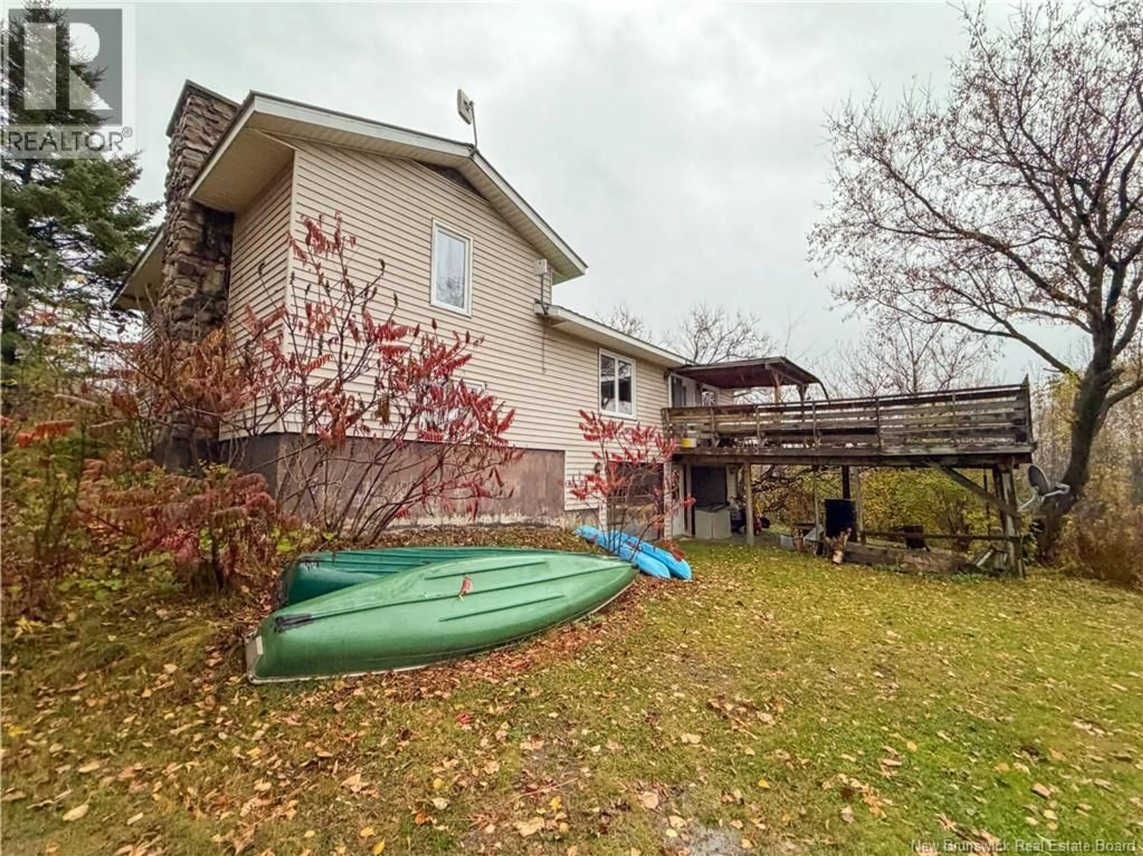 A pic from outside/outdoor area/front of a property/back of a property/a pic from drone, water/lake/river/ocean view for 403 TOBIQUE STREET, Plaster Rock New Brunswick E7G4A1