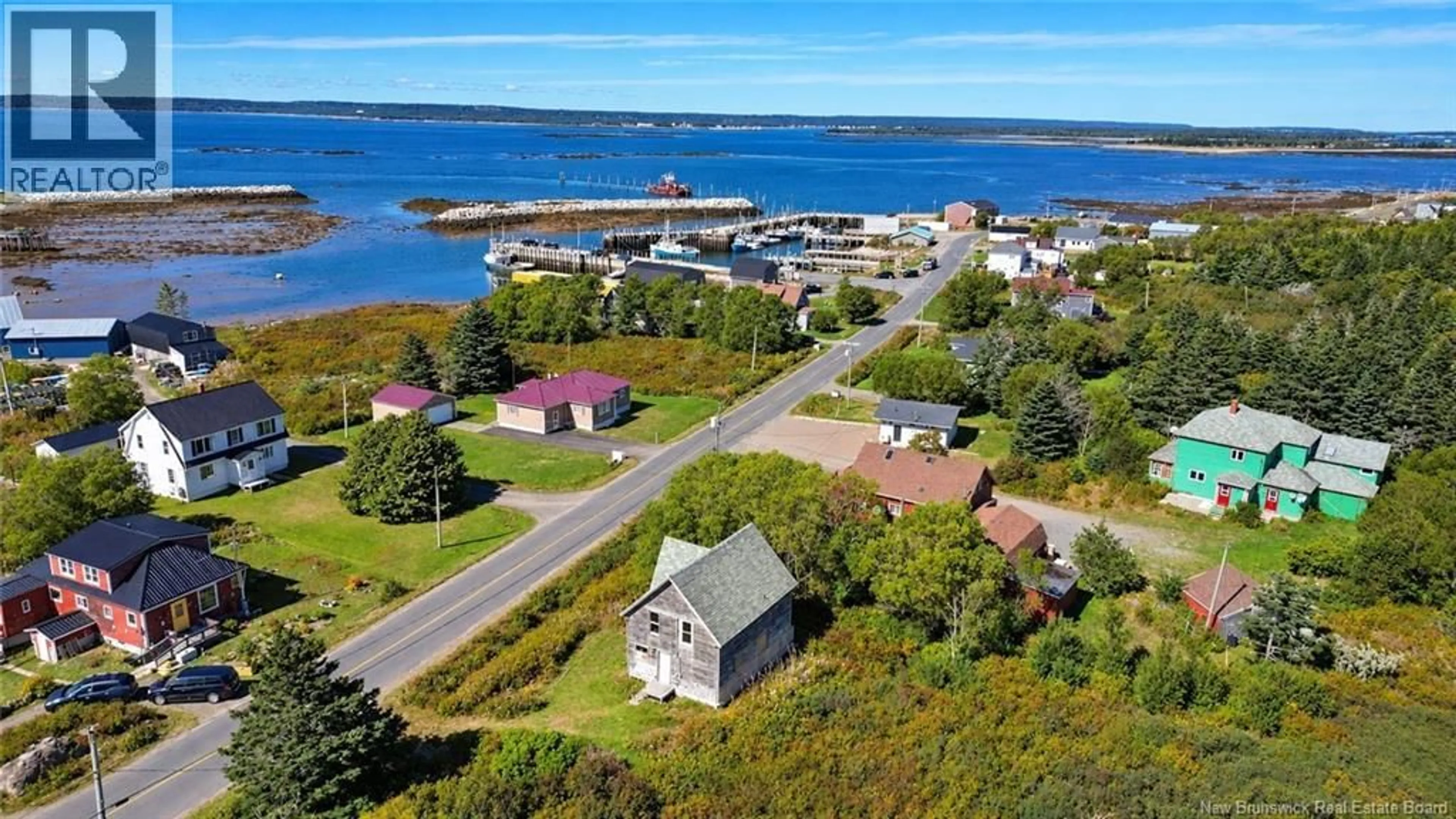 A pic from outside/outdoor area/front of a property/back of a property/a pic from drone, water/lake/river/ocean view for 112 WHITE HEAD ROAD, White Head Island New Brunswick E5G1K4