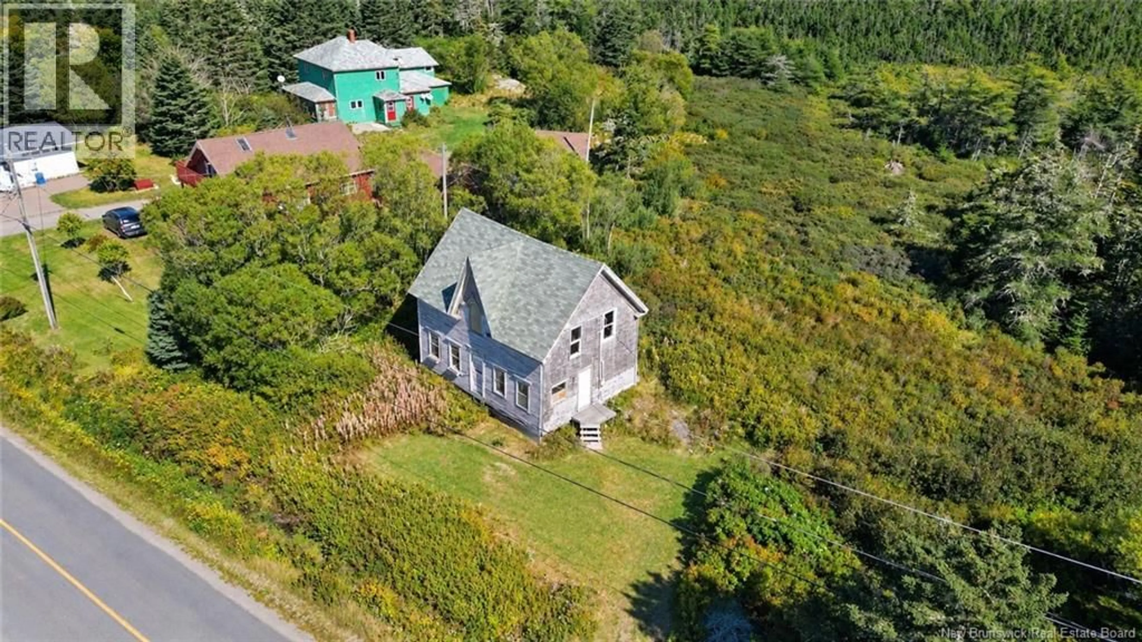 A pic from outside/outdoor area/front of a property/back of a property/a pic from drone, building for 112 WHITE HEAD ROAD, White Head Island New Brunswick E5G1K4