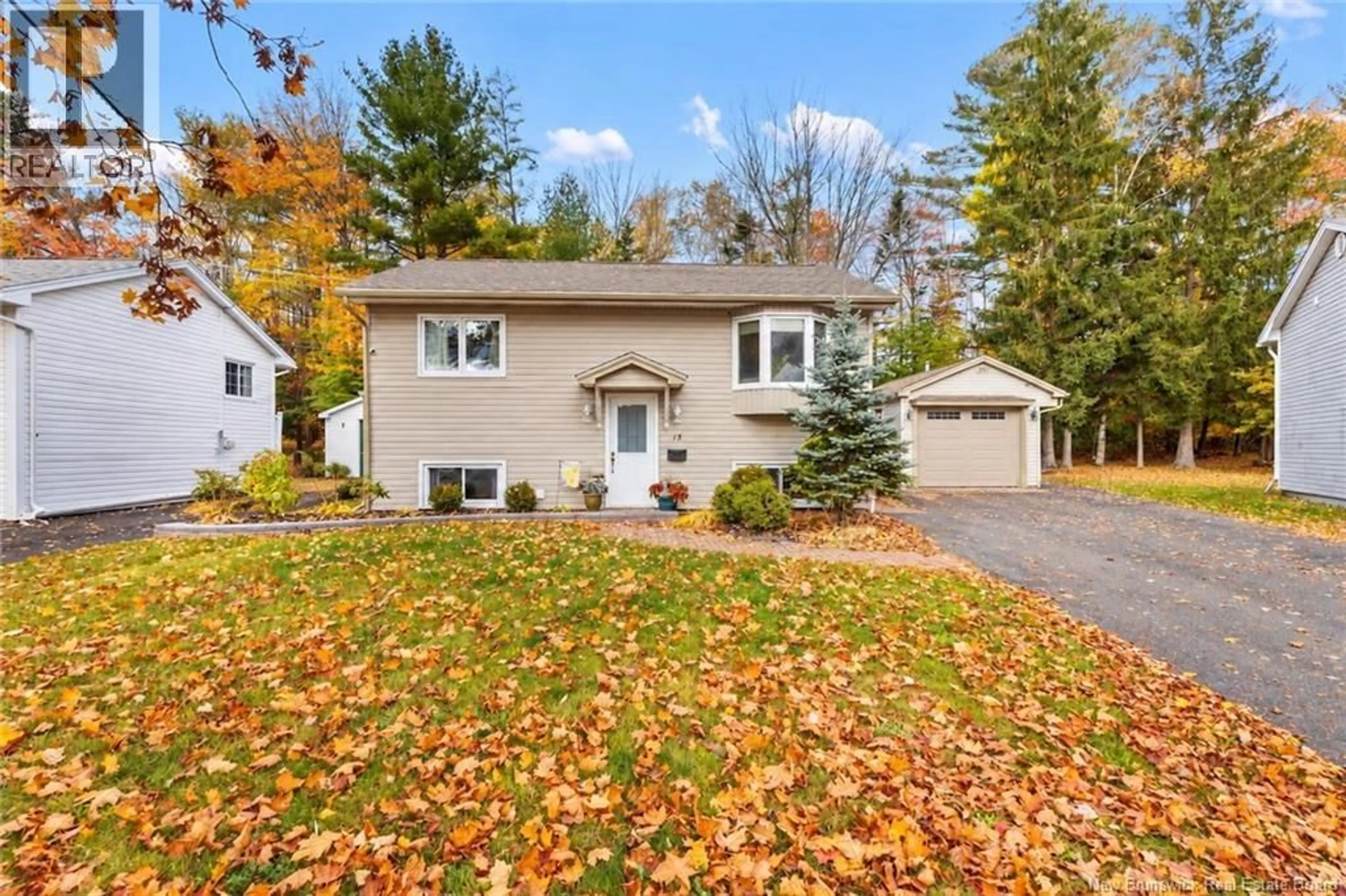 Home with vinyl exterior material, street for 15 LILAC CRESCENT, Fredericton New Brunswick E3A2G7