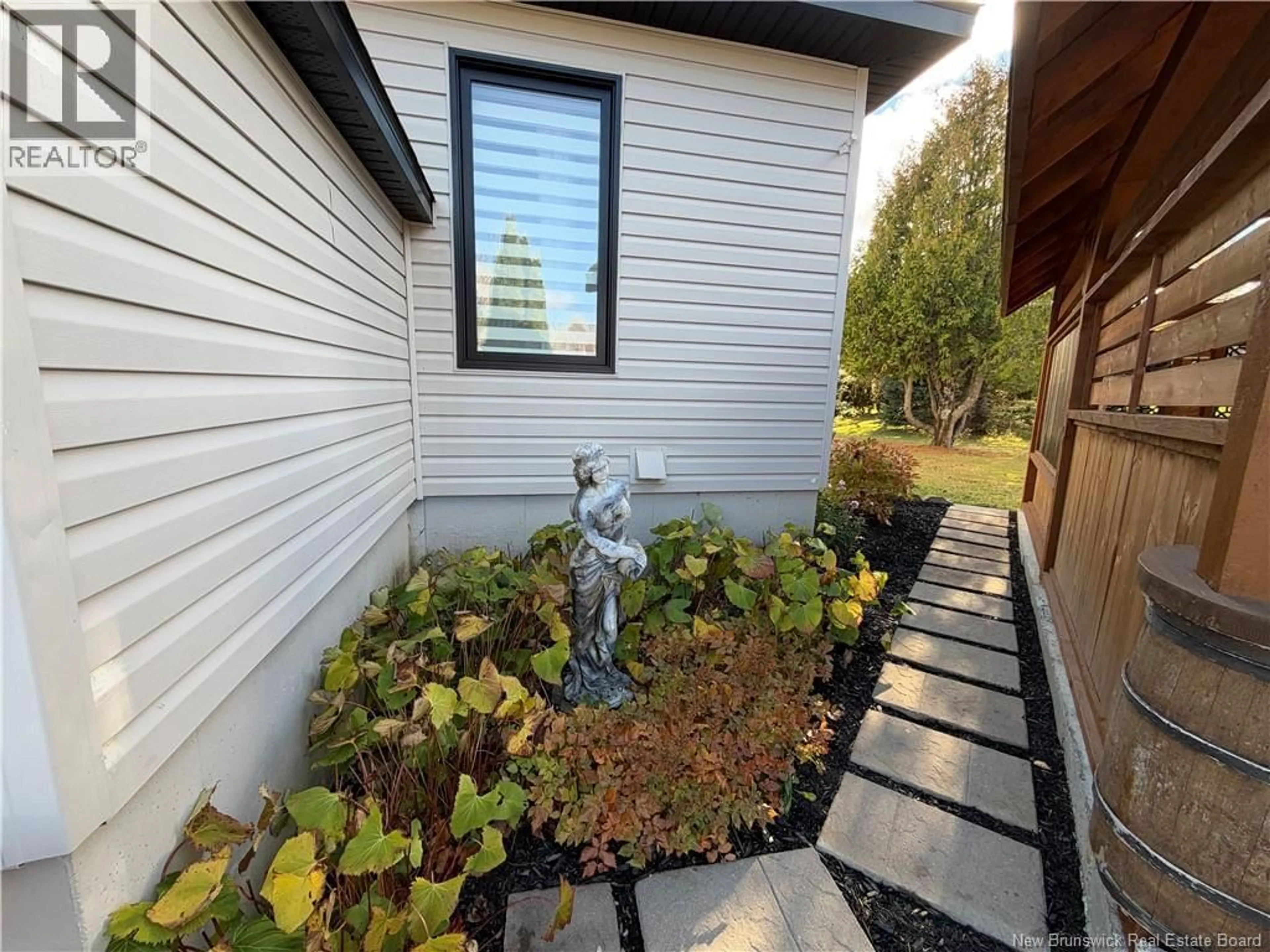 Home with vinyl exterior material, street for 418 ROUTE 180, Saint-Quentin New Brunswick E8A2K4