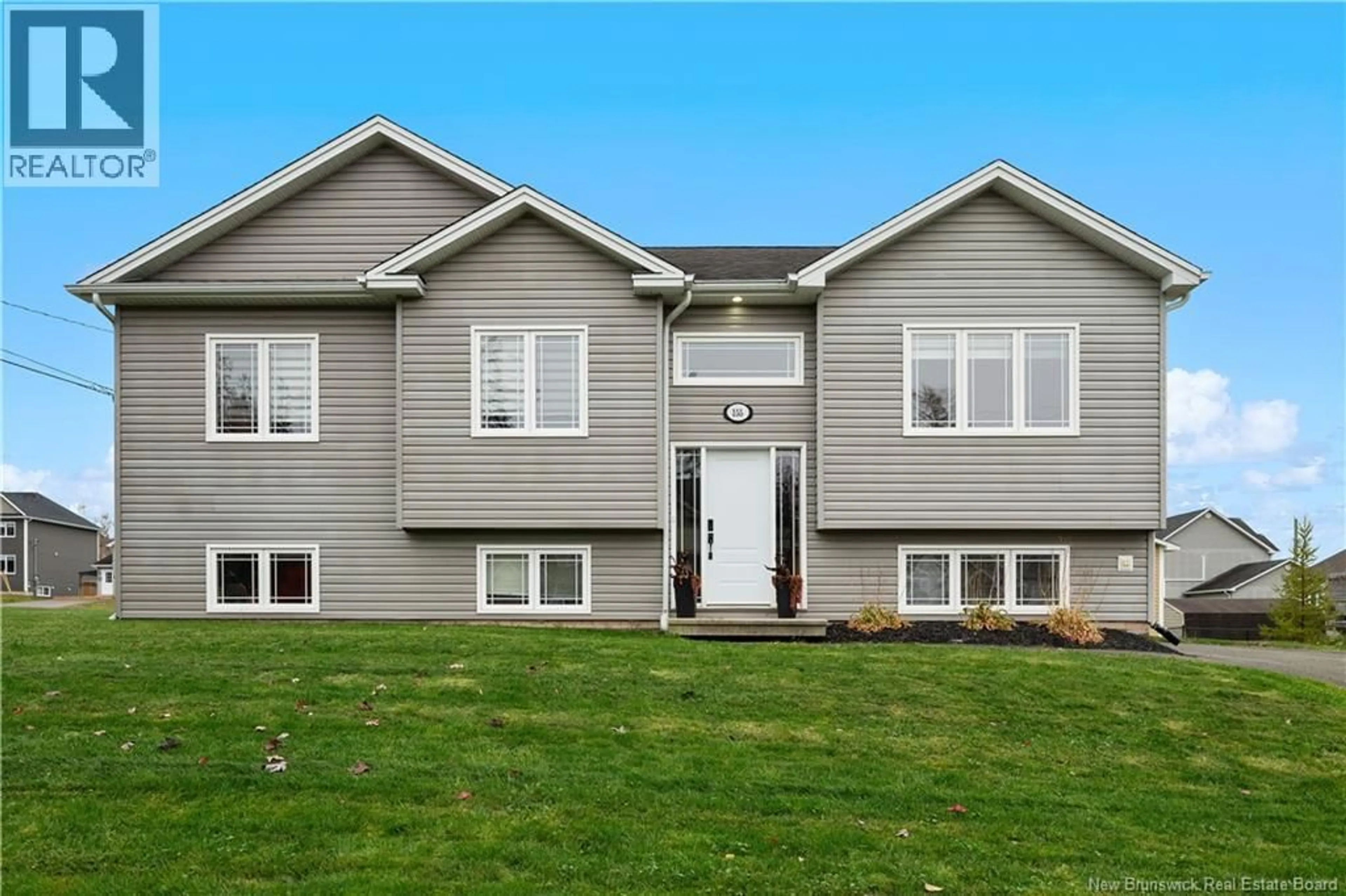 Home with vinyl exterior material, street for 155 DU MOULIN STREET, Dieppe New Brunswick E1A0Y3