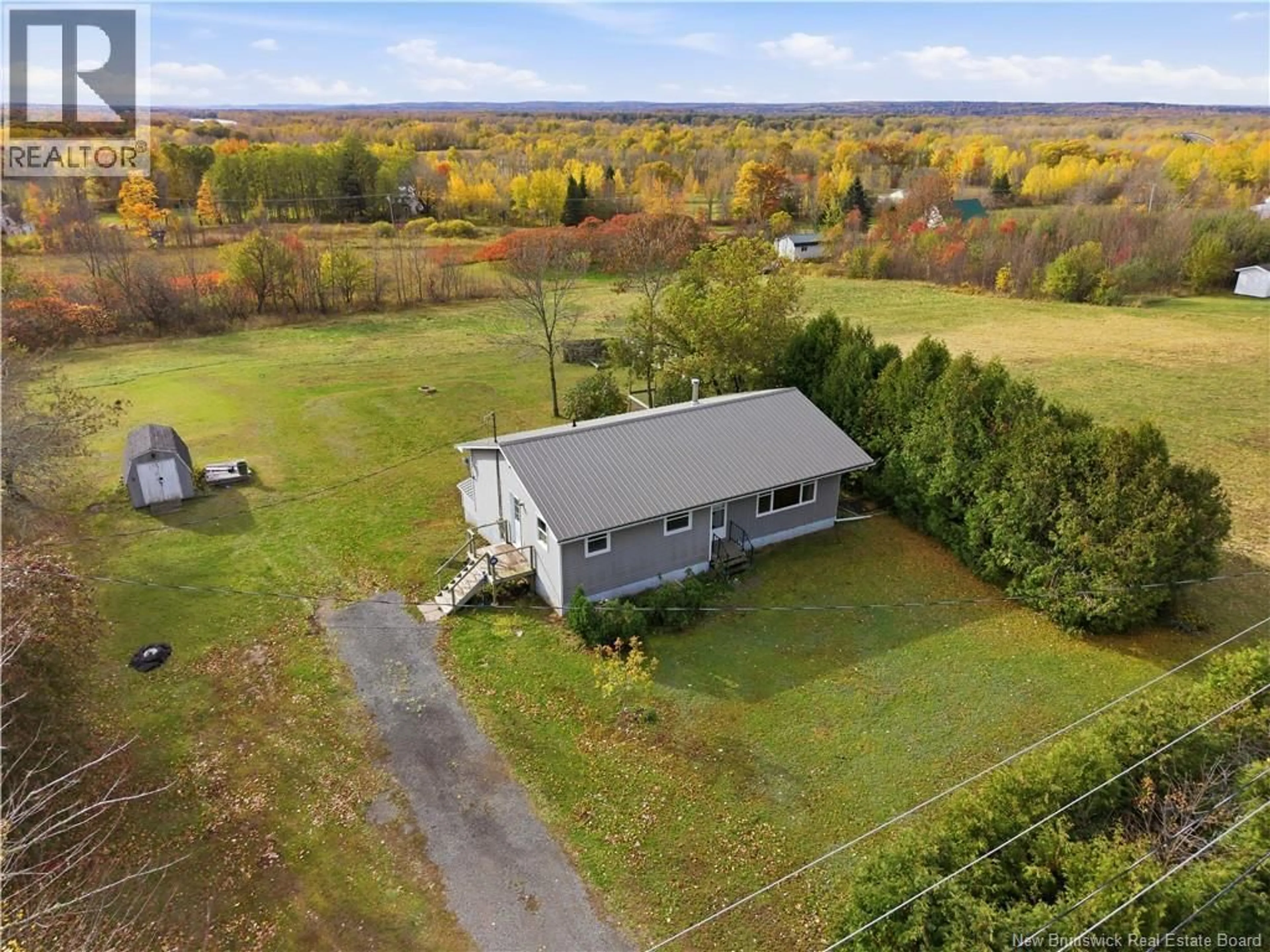 A pic from outside/outdoor area/front of a property/back of a property/a pic from drone, unknown for 34 ROUTE 695, Jemseg New Brunswick E4C3M6