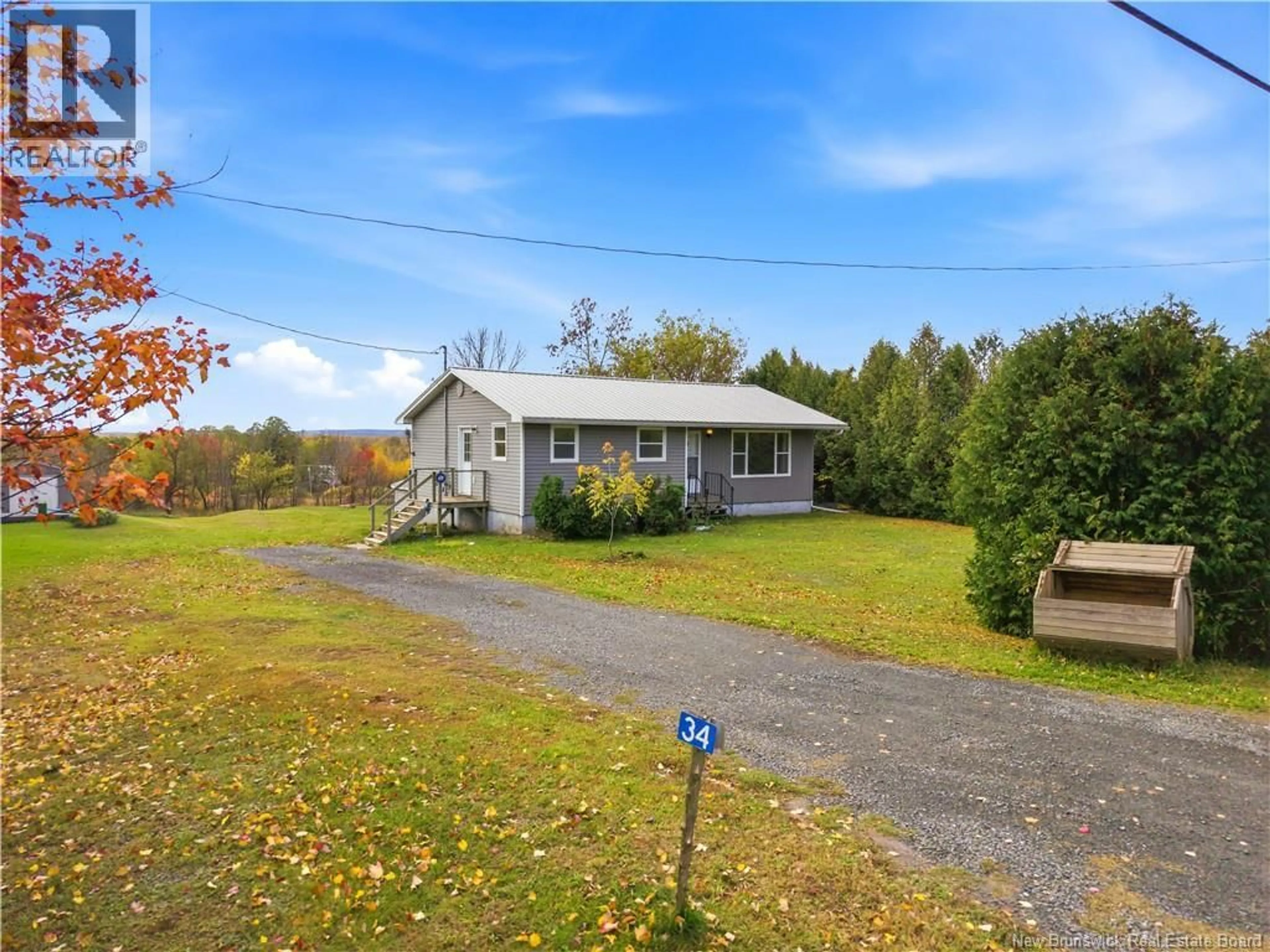 A pic from outside/outdoor area/front of a property/back of a property/a pic from drone, unknown for 34 ROUTE 695, Jemseg New Brunswick E4C3M6