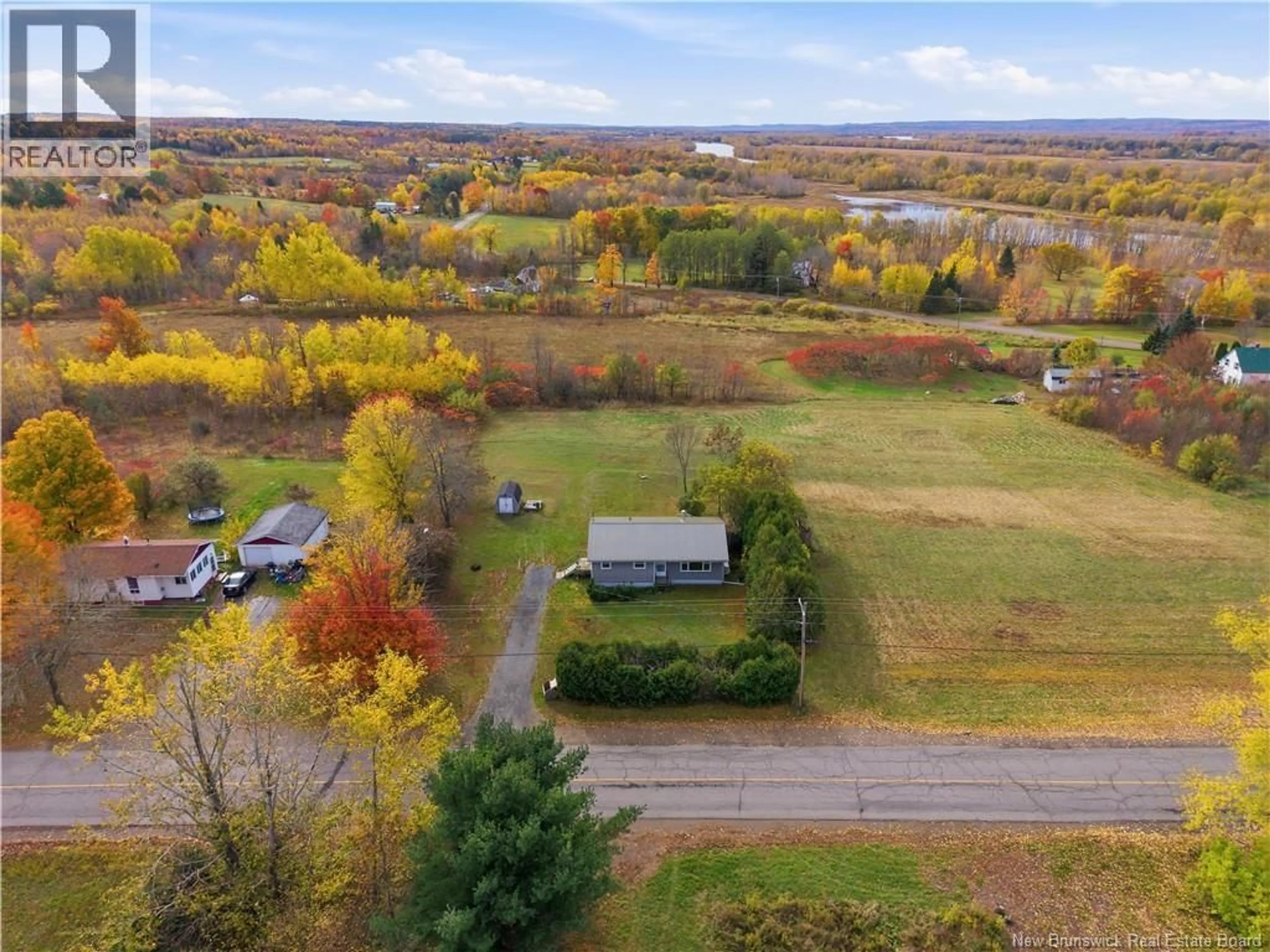 A pic from outside/outdoor area/front of a property/back of a property/a pic from drone, water/lake/river/ocean view for 34 ROUTE 695, Jemseg New Brunswick E4C3M6