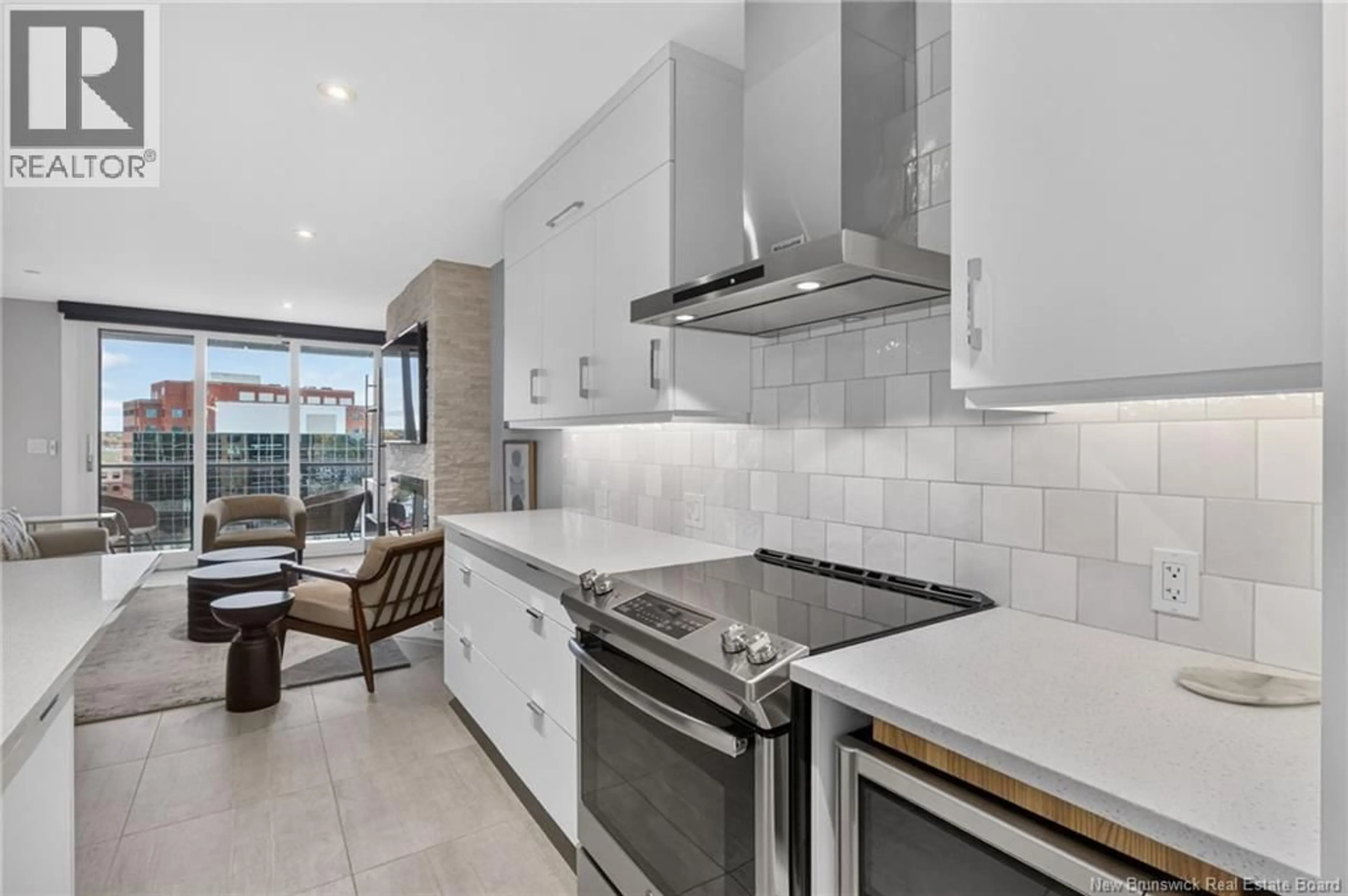 Open concept kitchen, ceramic/tile floor for 715 - 55 QUEEN STREET, Moncton New Brunswick E1C1K2