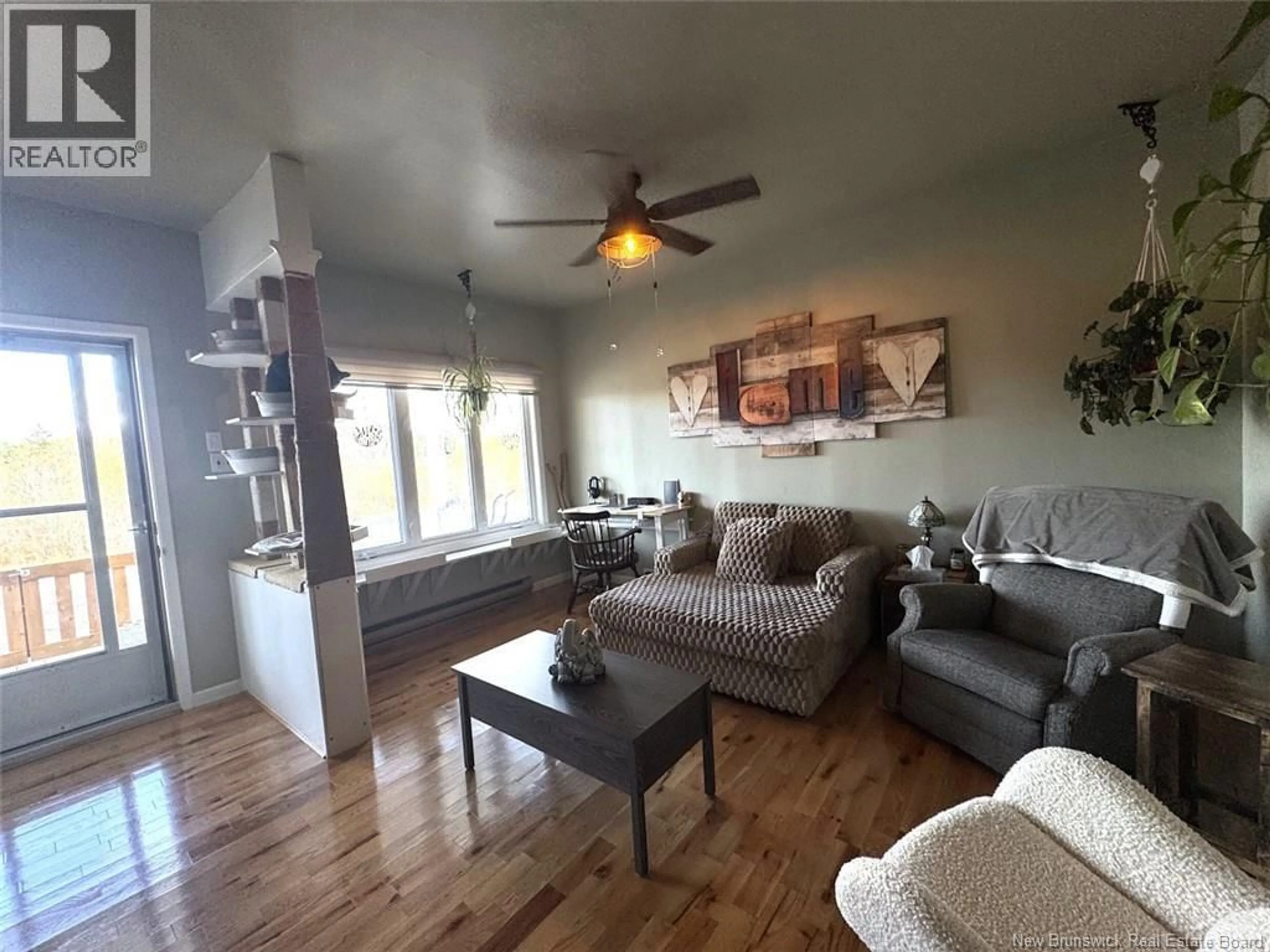 Living room with furniture, wood/laminate floor for 168 THÉRIAULT ROAD, Sainte-Anne-De-Madawaska New Brunswick E7E1S6