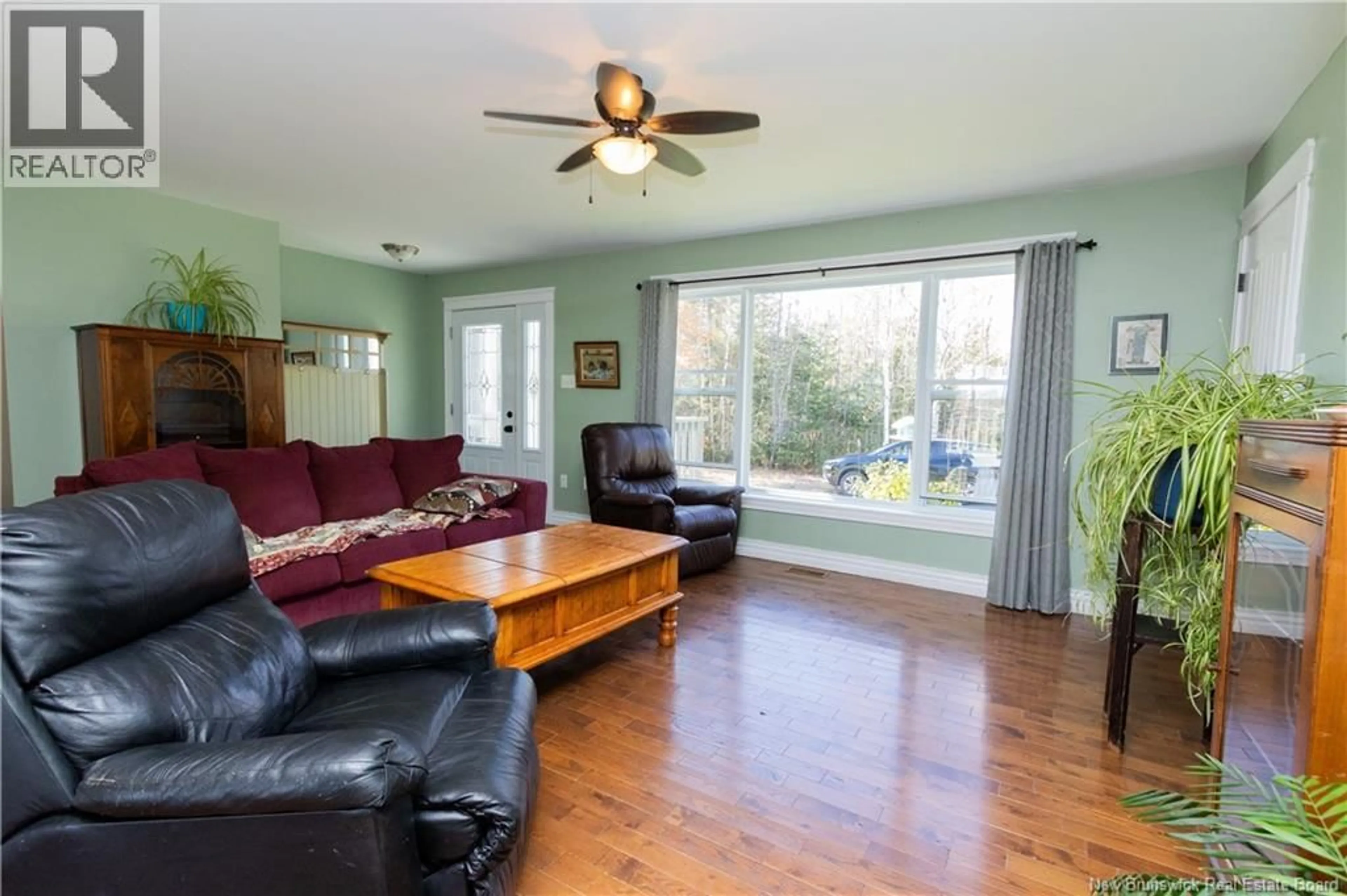 Living room with furniture, wood/laminate floor for 521 ROUTE 3, Smithfield New Brunswick E6K2T3