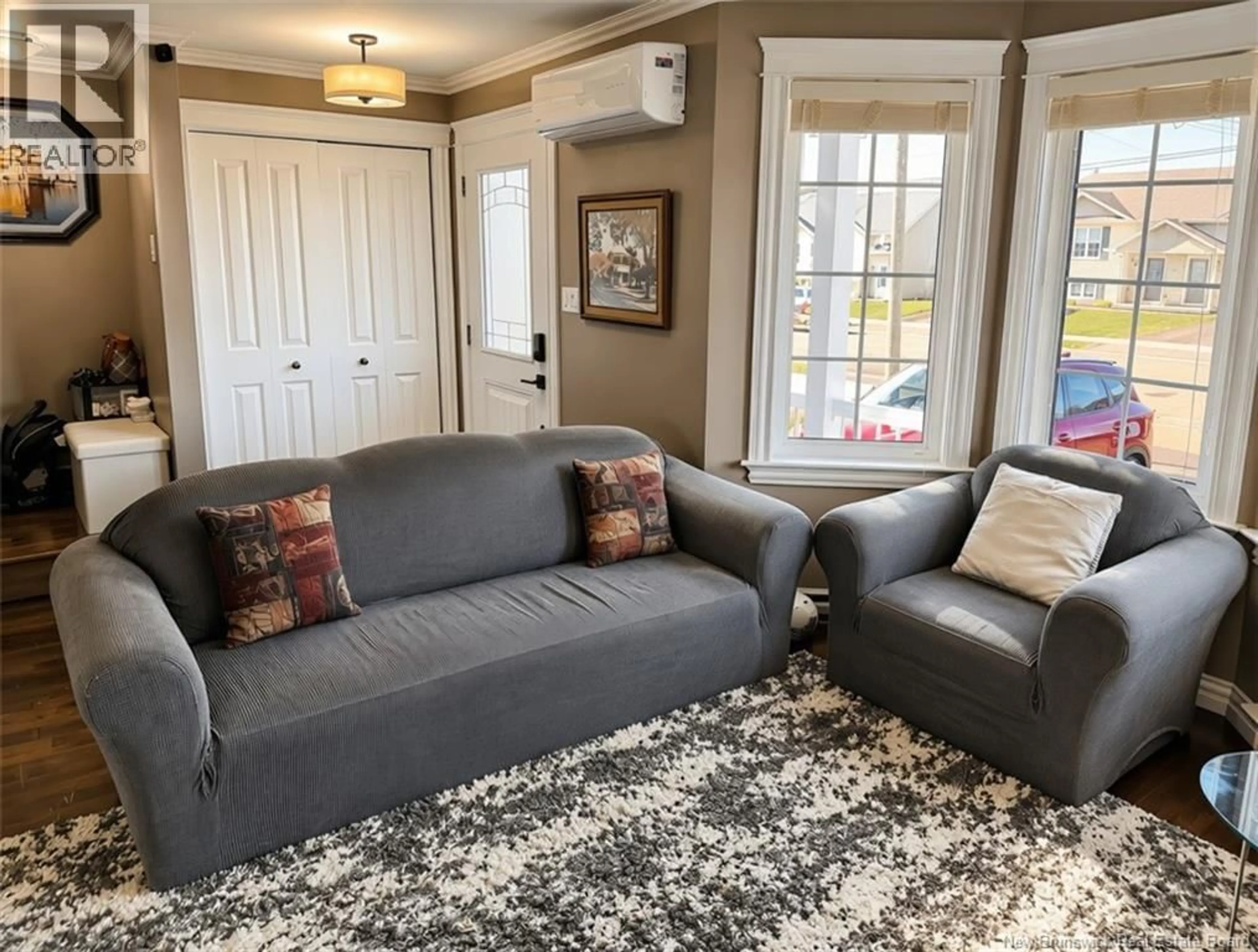 Living room with furniture, carpet floor for 149 LAKEBURN AVENUE, Dieppe New Brunswick E1A8N5