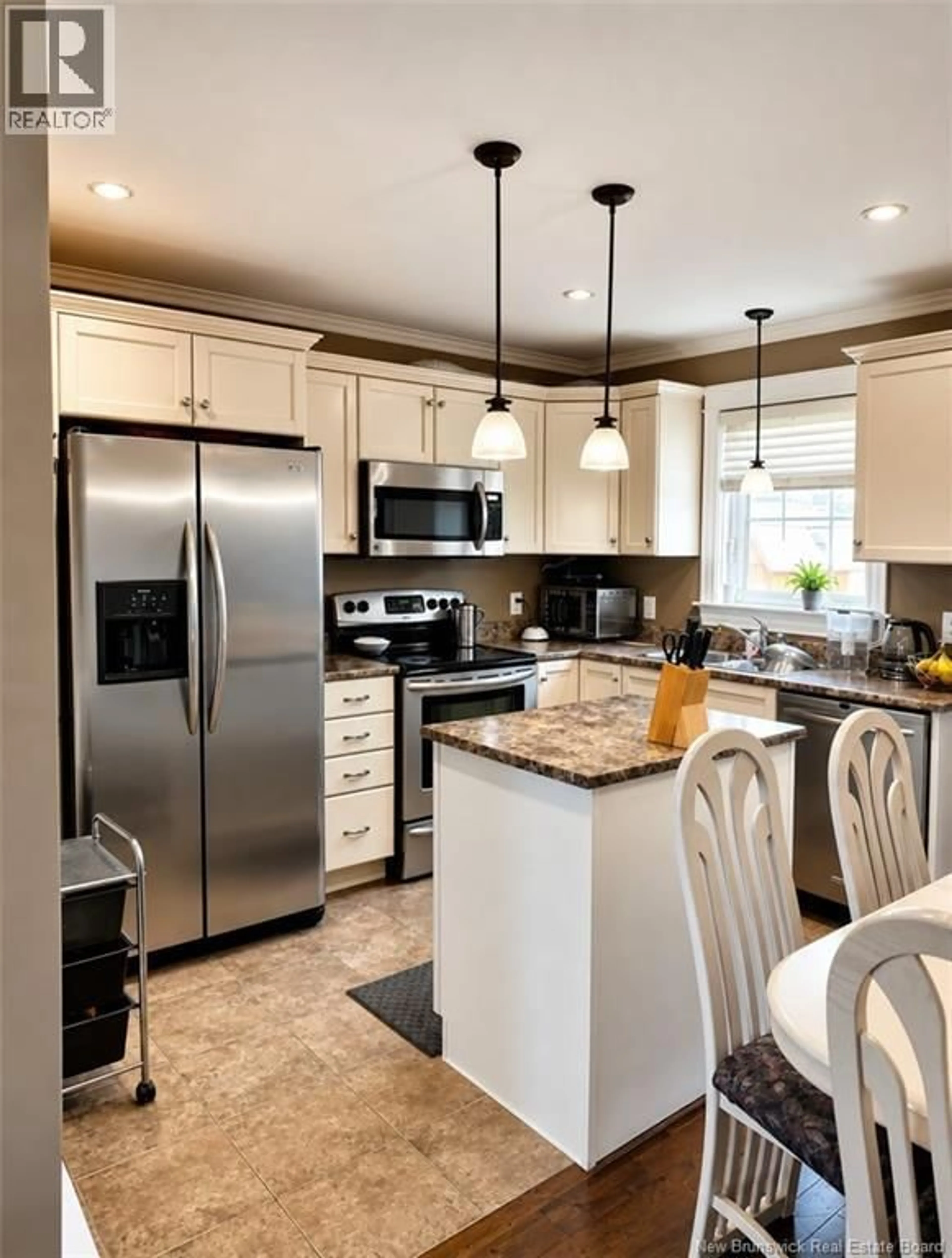 Open concept kitchen, ceramic/tile floor for 149 LAKEBURN AVENUE, Dieppe New Brunswick E1A8N5