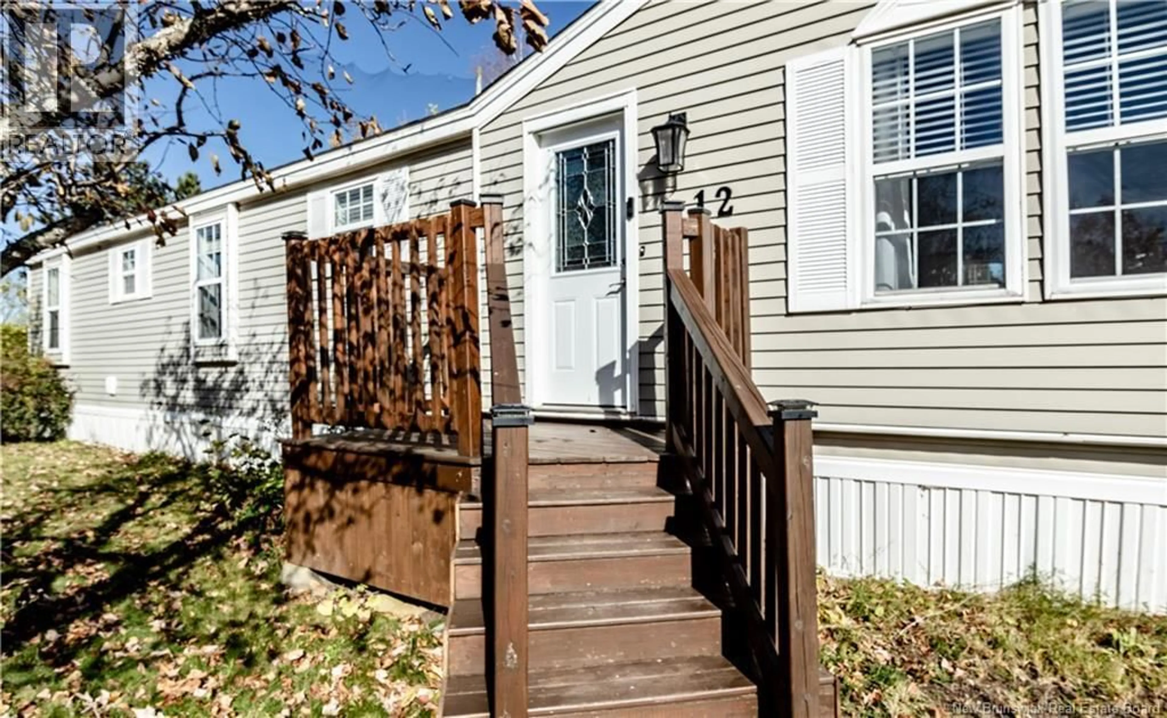 Home with vinyl exterior material, street for 12 PHEASANT STREET, Moncton New Brunswick E1H2Z4