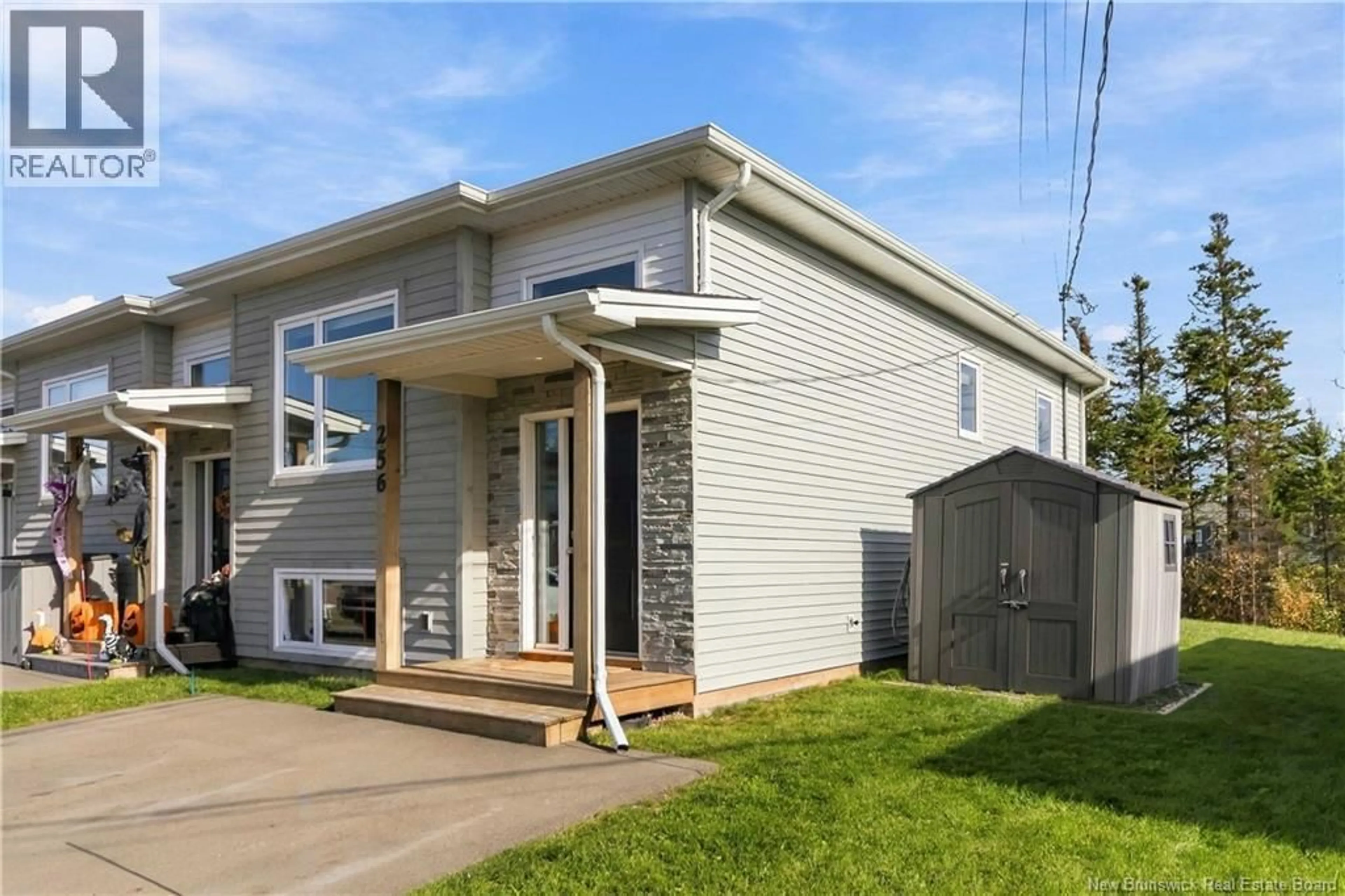 Home with vinyl exterior material, street for 256 FALCON DRIVE, Moncton New Brunswick E1G6H1