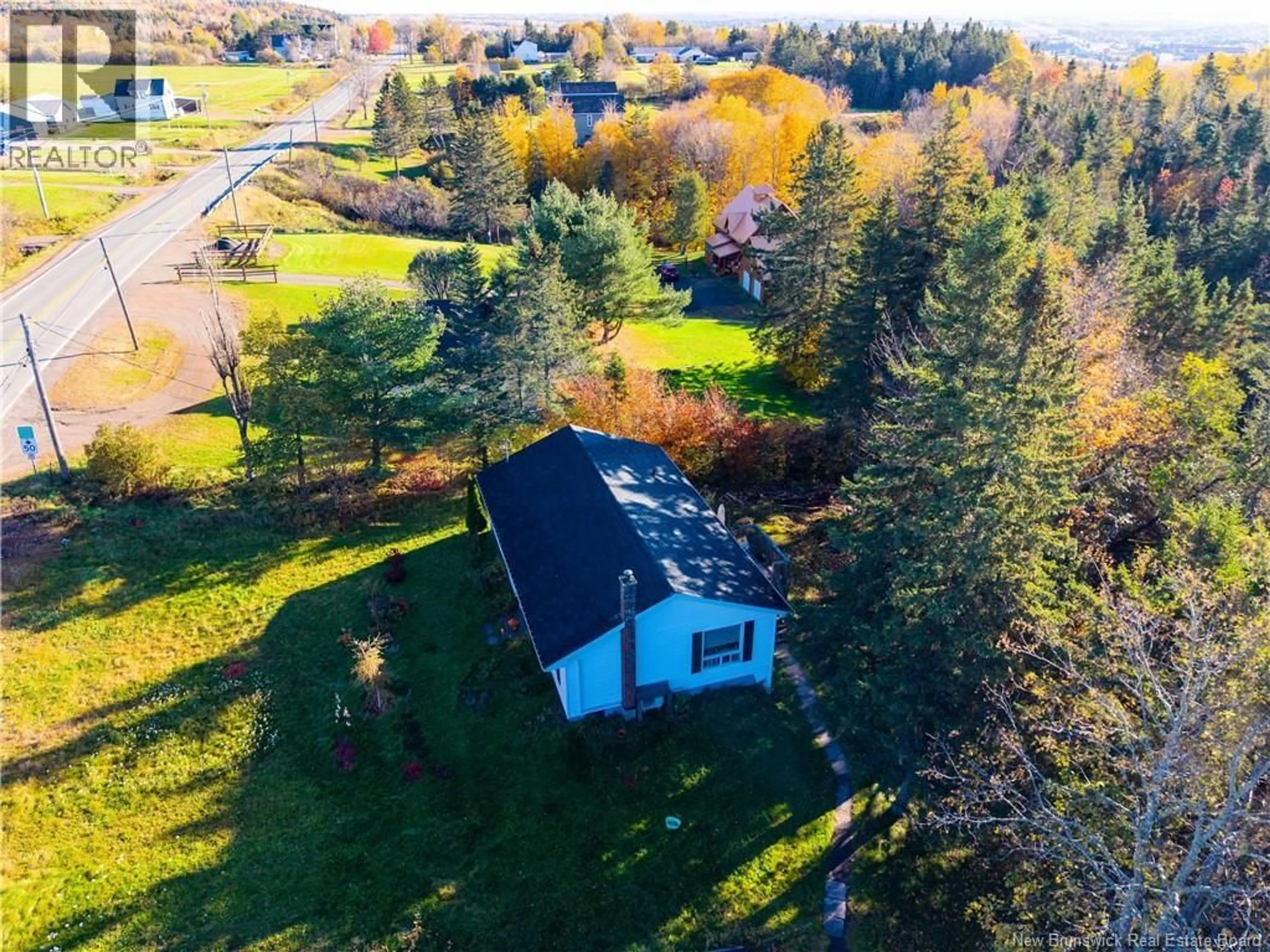A pic from outside/outdoor area/front of a property/back of a property/a pic from drone, water/lake/river/ocean view for 3256 MOUNTAIN ROAD, Moncton New Brunswick E1G2W8