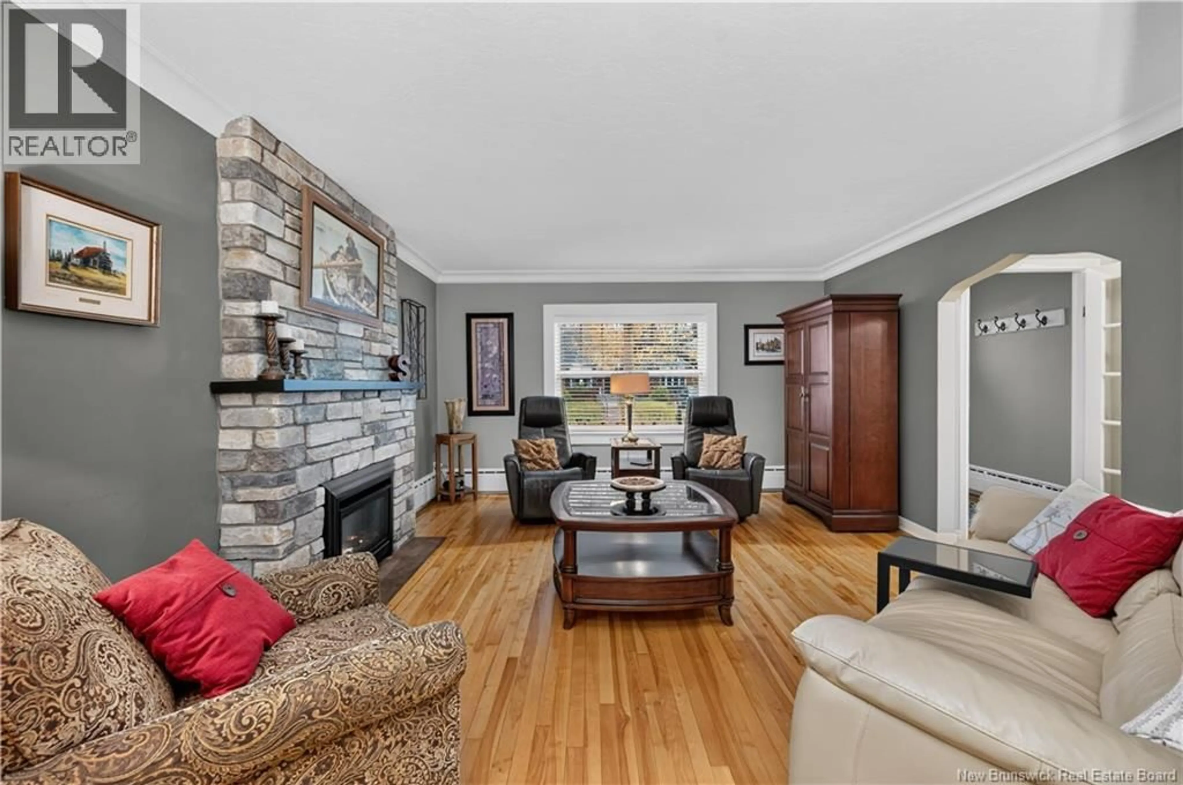 Living room with furniture, wood/laminate floor for 17 GRANDVIEW DRIVE, Moncton New Brunswick E1E3J9