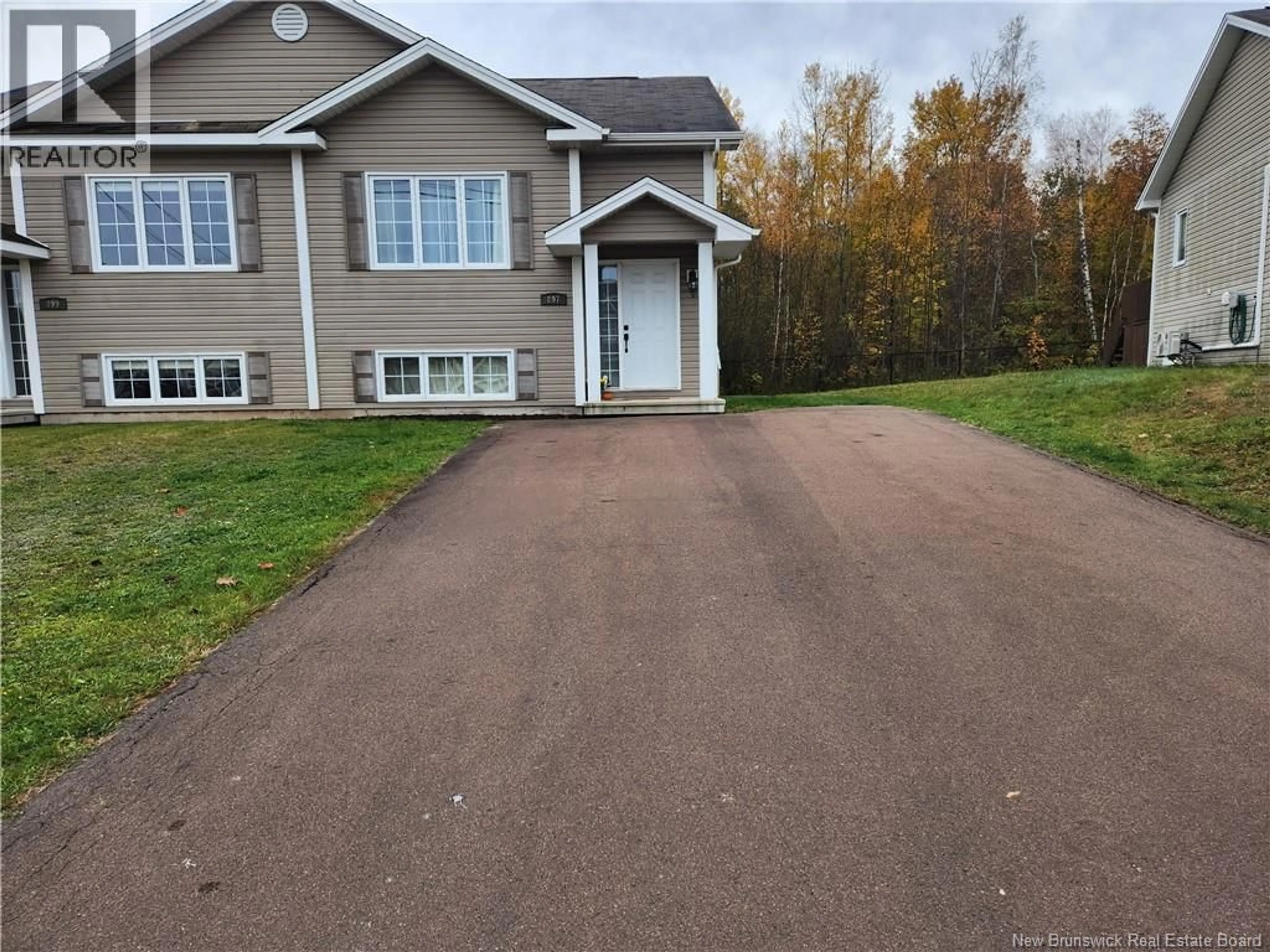 Home with vinyl exterior material, street for 897 BERNARD STREET, Dieppe New Brunswick E1A4A6