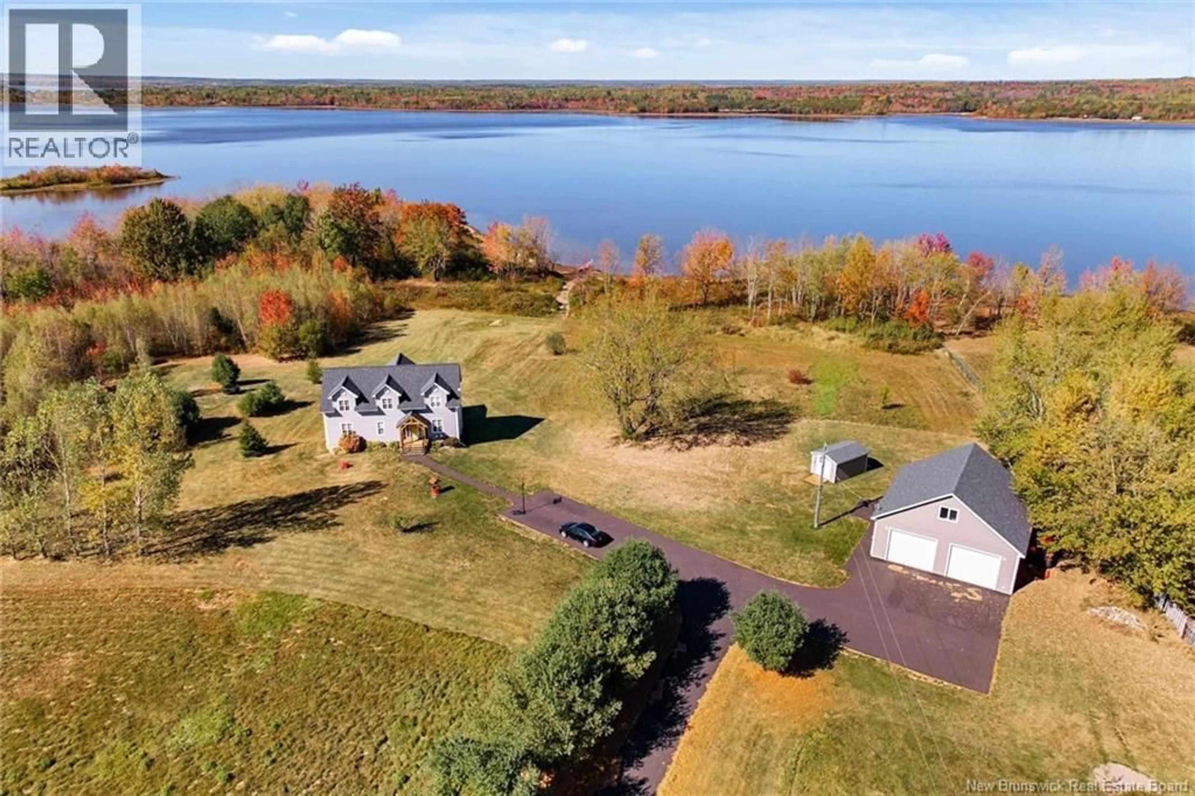 A pic from outside/outdoor area/front of a property/back of a property/a pic from drone, water/lake/river/ocean view for 8414 ROUTE 10, Cumberland Bay New Brunswick E4A2W7