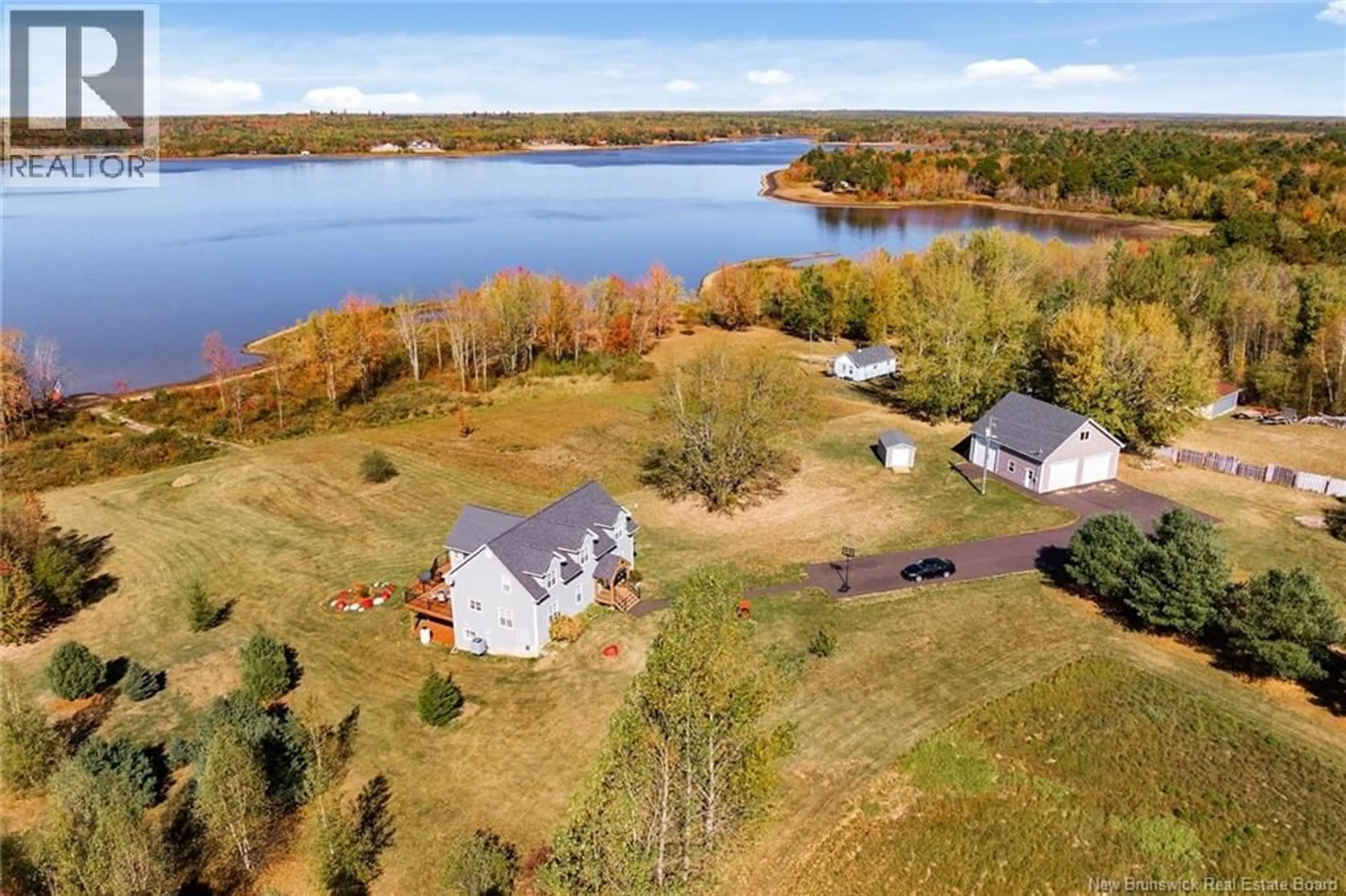 A pic from outside/outdoor area/front of a property/back of a property/a pic from drone, water/lake/river/ocean view for 8414 ROUTE 10, Cumberland Bay New Brunswick E4A2W7