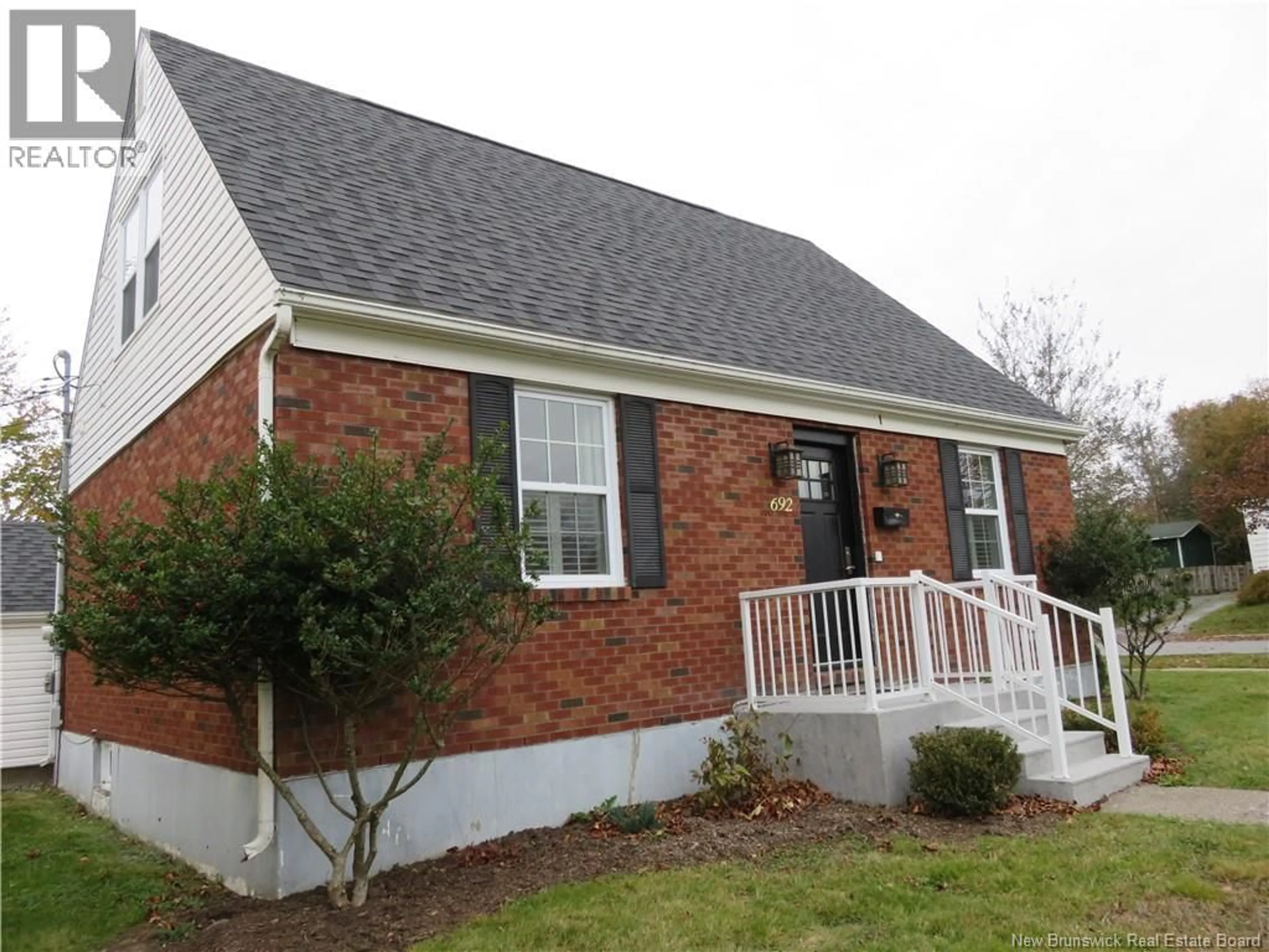 Home with vinyl exterior material, street for 692 DUNN AVENUE, Saint John New Brunswick E2M2X8