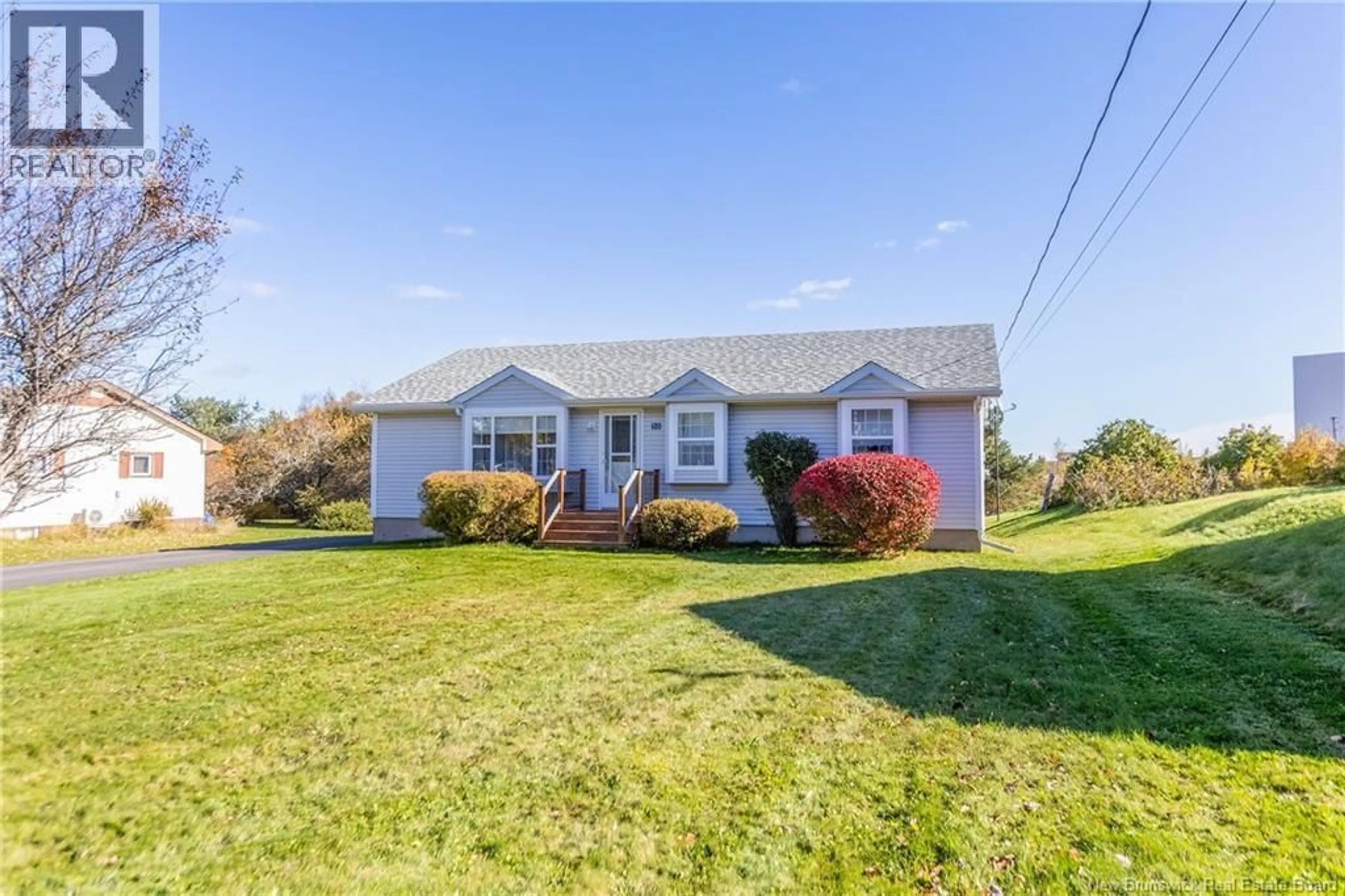 Home with vinyl exterior material, street for 50 CHARLES STREET, Sackville New Brunswick E4L3S6