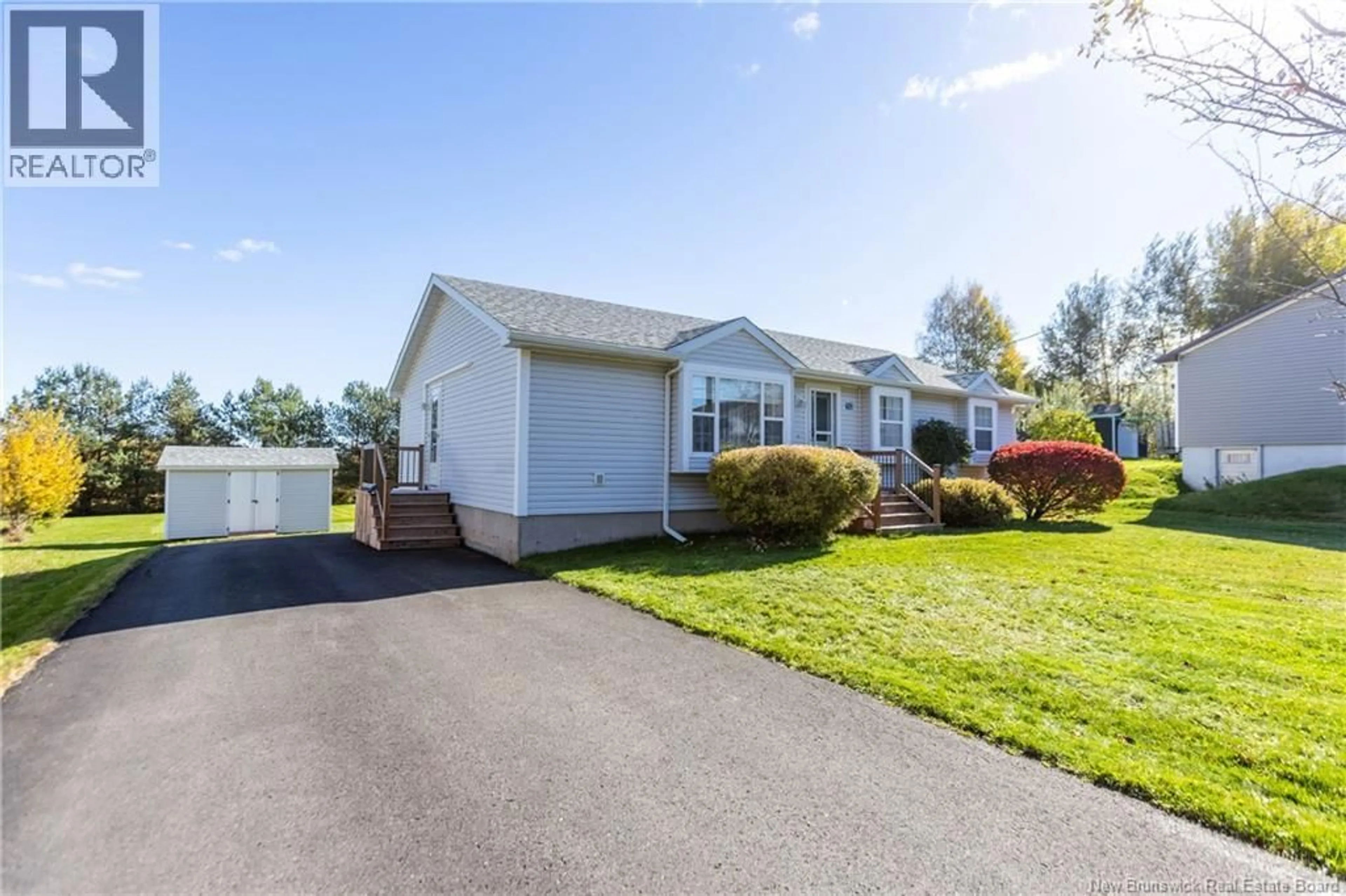 Home with vinyl exterior material, street for 50 CHARLES STREET, Sackville New Brunswick E4L3S6