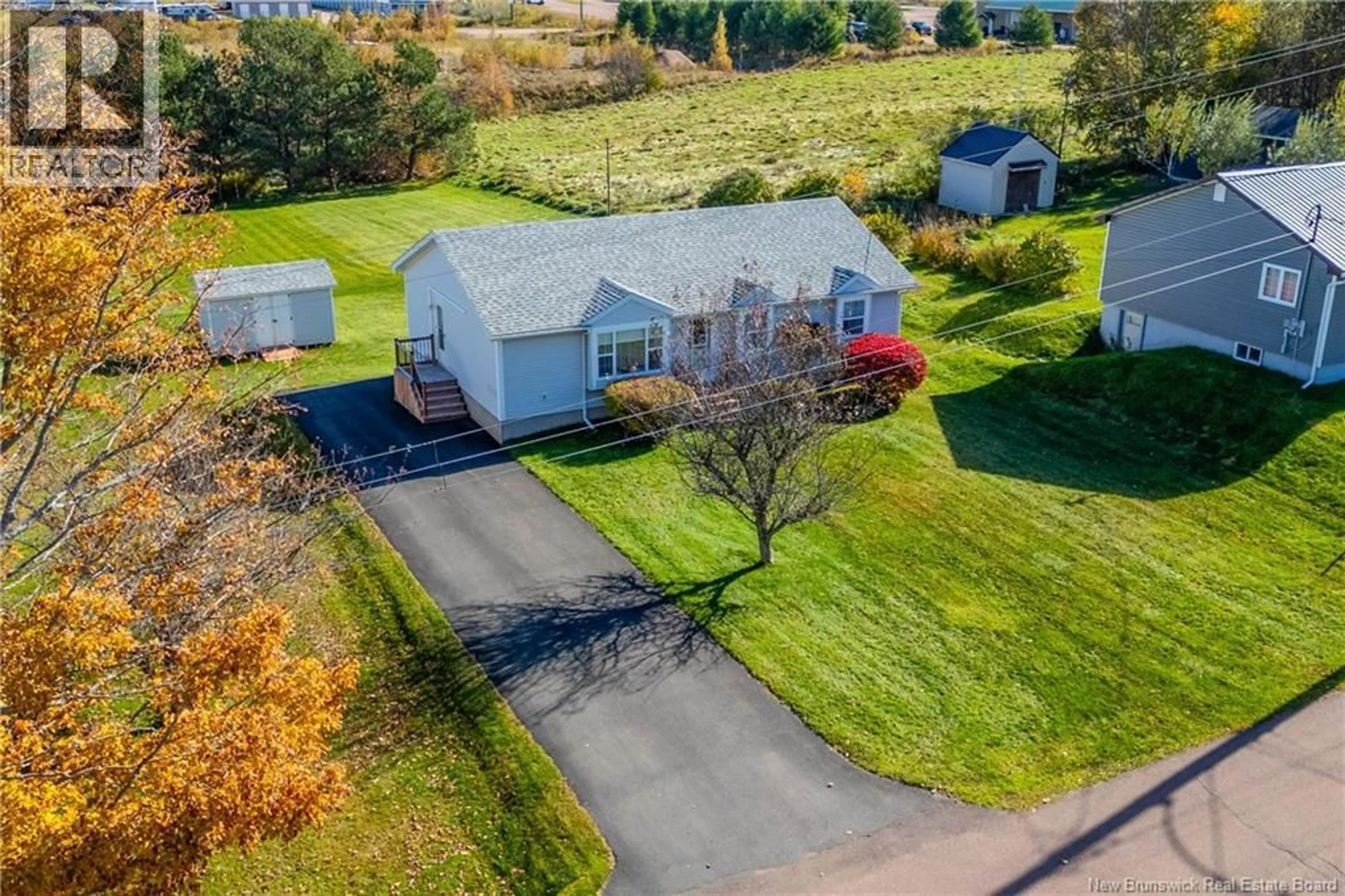 A pic from outside/outdoor area/front of a property/back of a property/a pic from drone, unknown for 50 CHARLES STREET, Sackville New Brunswick E4L3S6