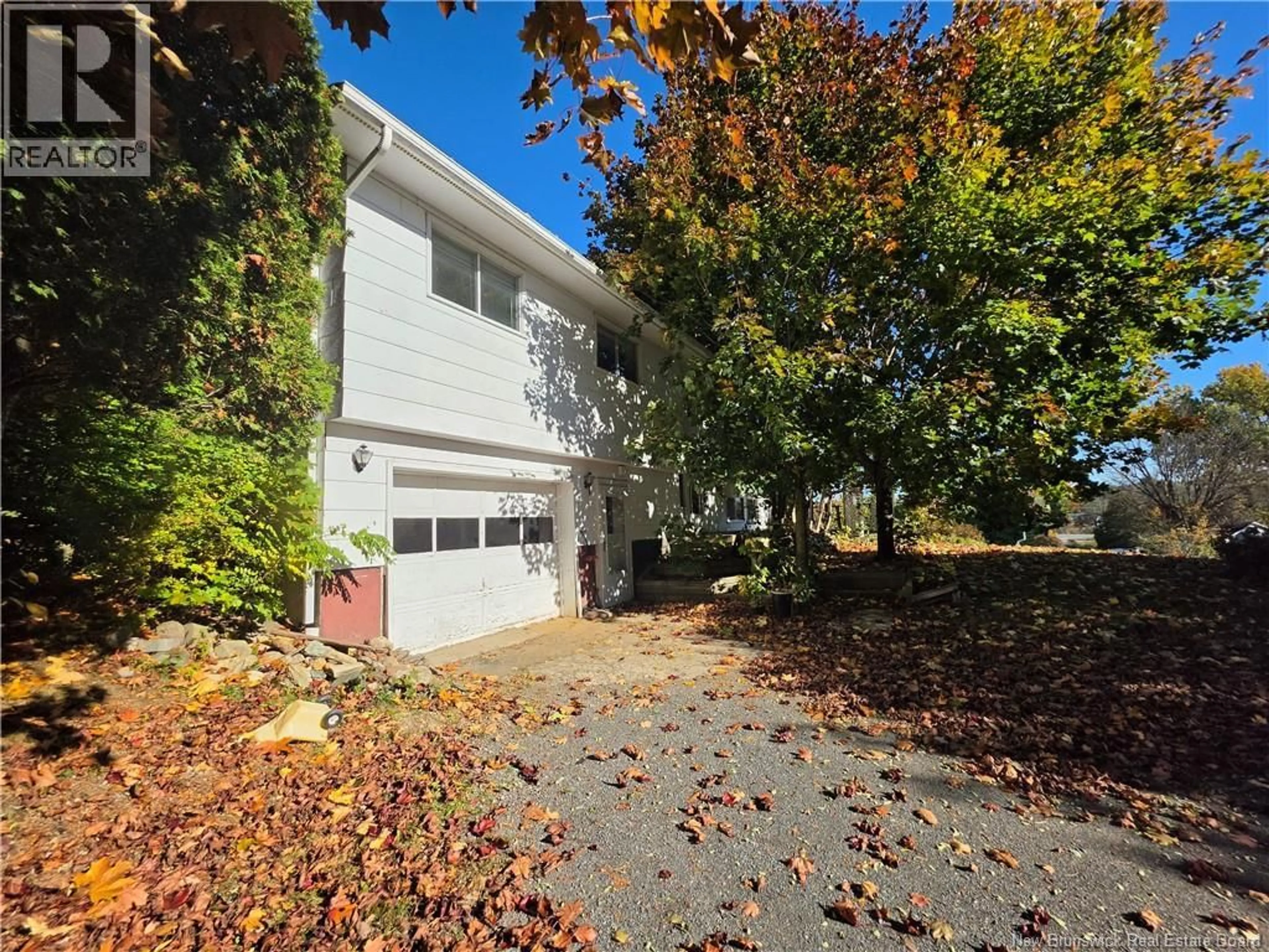 A pic from outside/outdoor area/front of a property/back of a property/a pic from drone, street for 715 CLEMENTS DRIVE, Fredericton New Brunswick E3A7J2