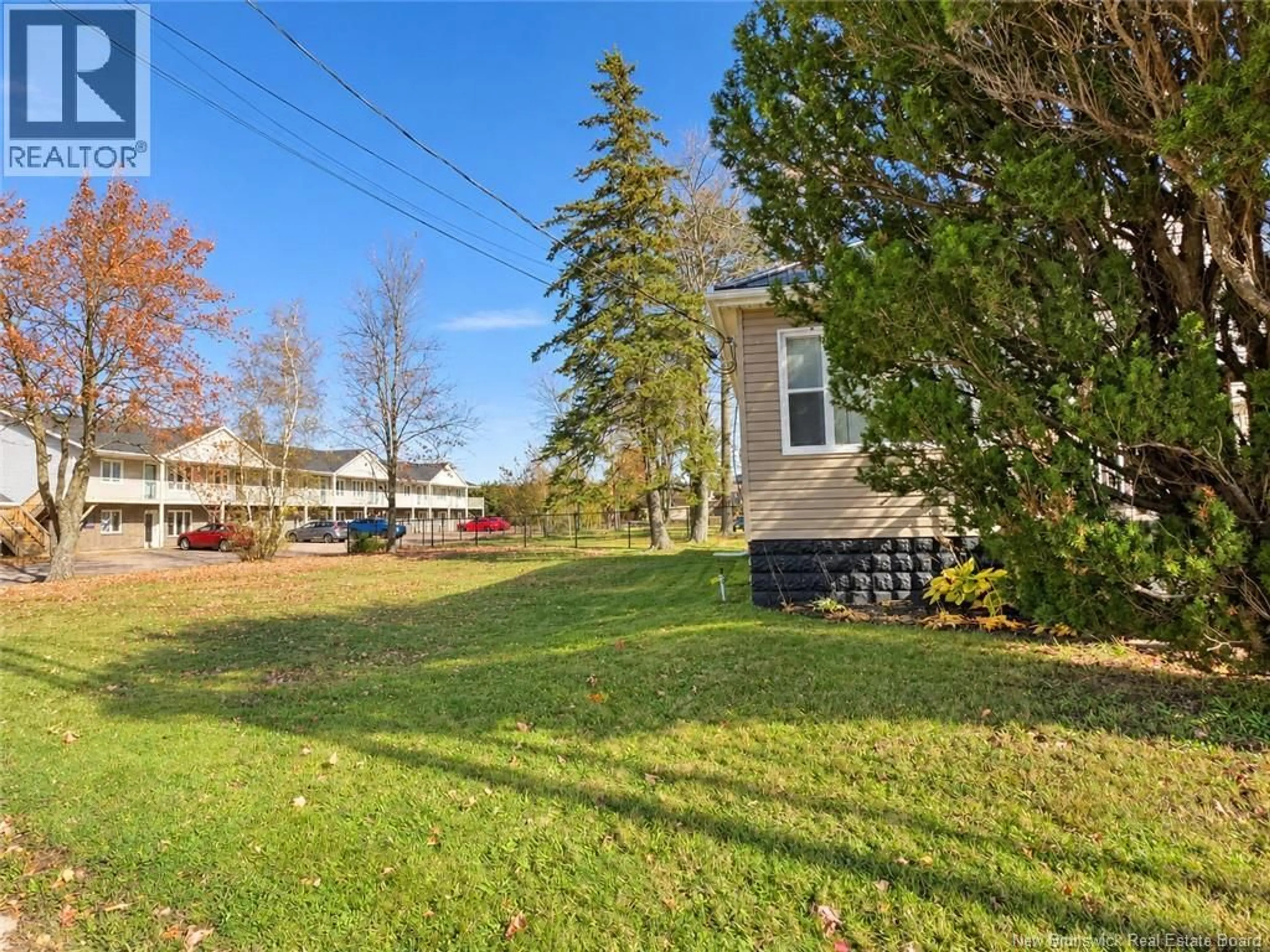 A pic from outside/outdoor area/front of a property/back of a property/a pic from drone, street for 473 ELMWOOD DRIVE, Moncton New Brunswick E1A2X4