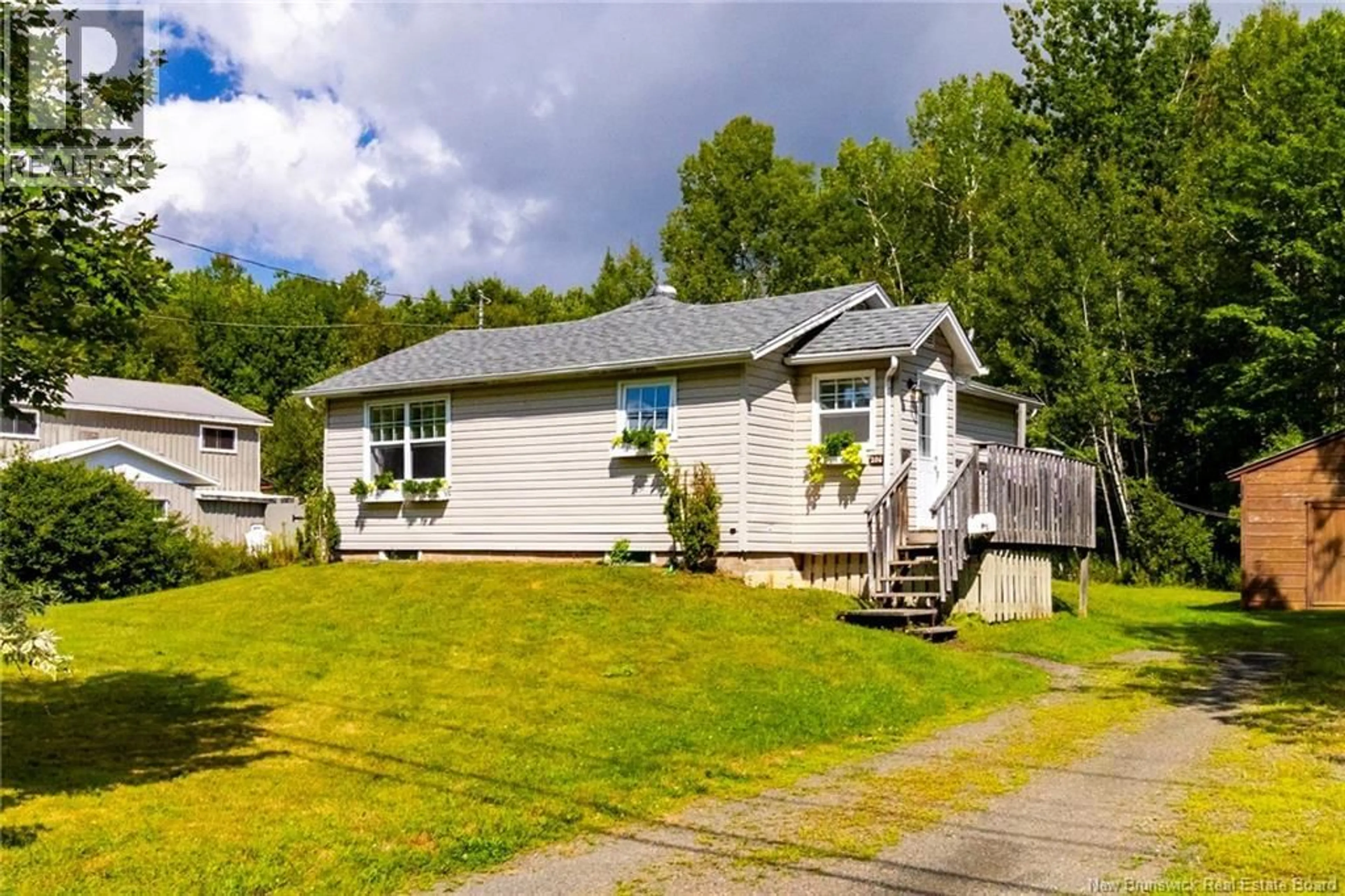 Home with vinyl exterior material, street for 206 CLAUDIE ROAD, Fredericton New Brunswick E3G6M4