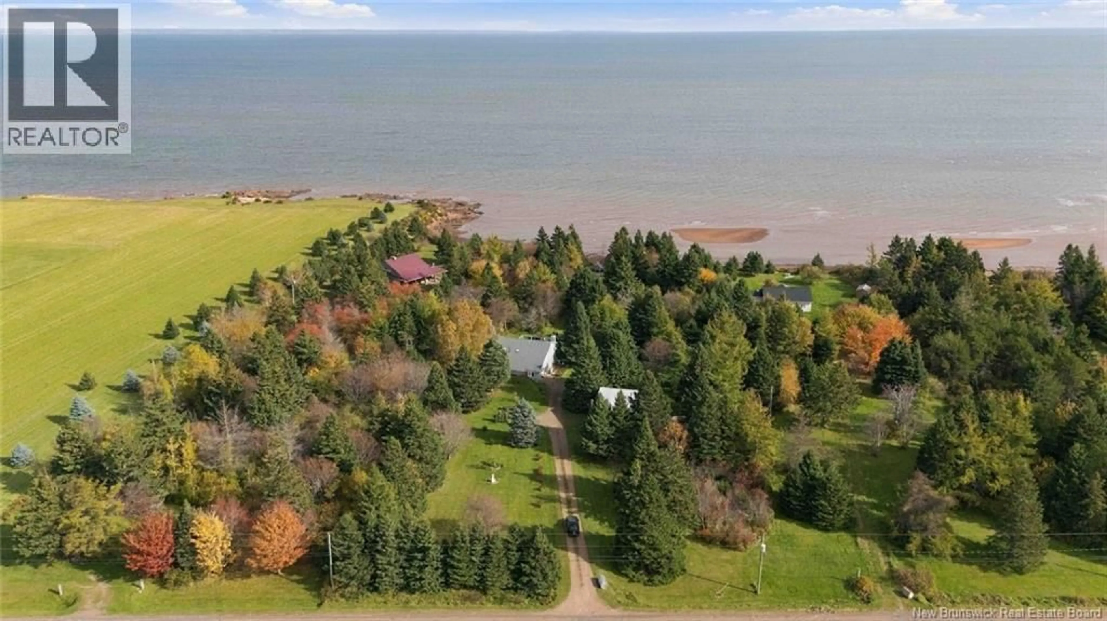 A pic from outside/outdoor area/front of a property/back of a property/a pic from drone, water/lake/river/ocean view for 158 ROUTE 960, Cape Tormentine New Brunswick E4M2C6