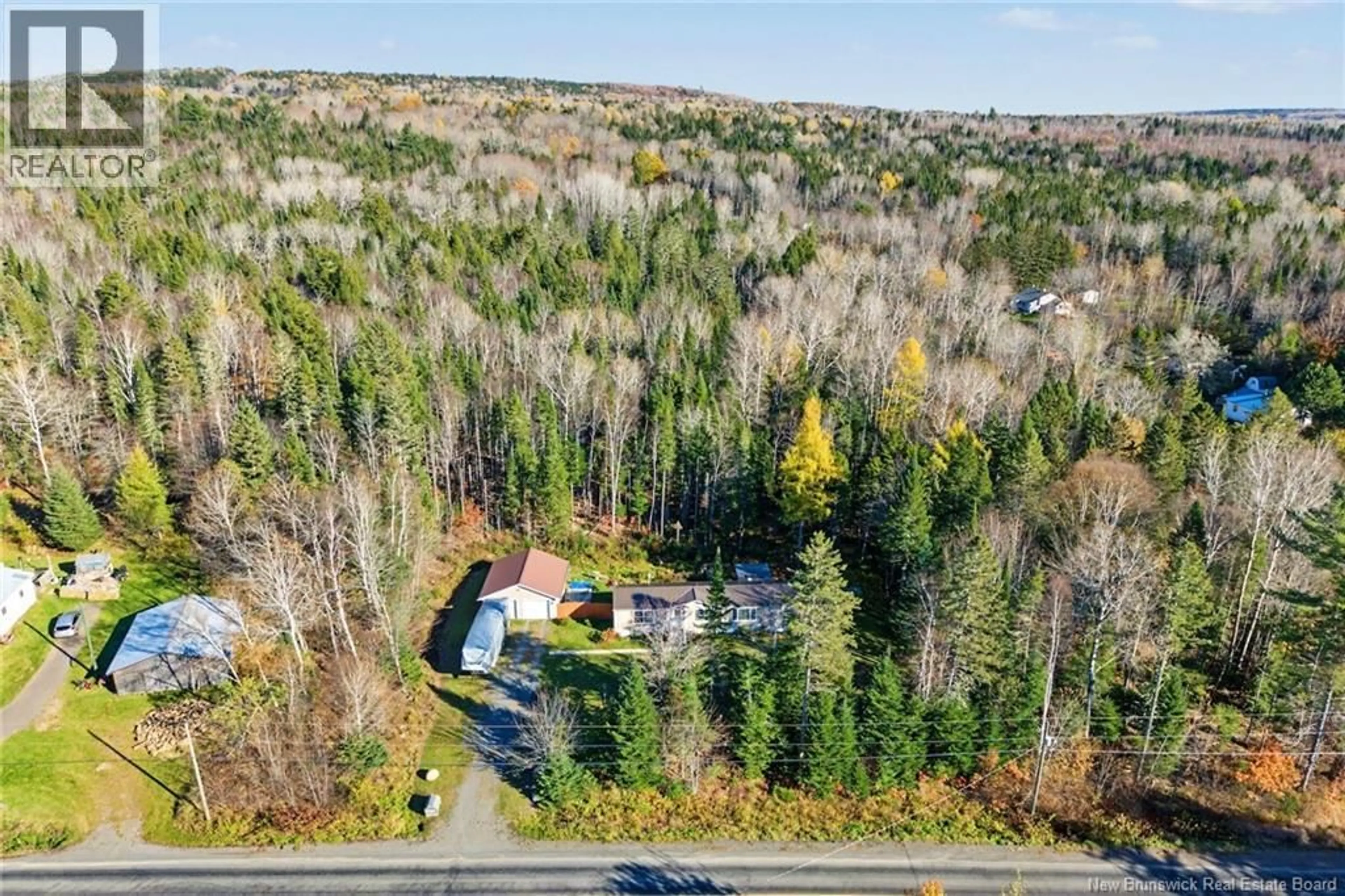 A pic from outside/outdoor area/front of a property/back of a property/a pic from drone, forest/trees view for 1072 RTE 628, Taymouth New Brunswick E6C2B7