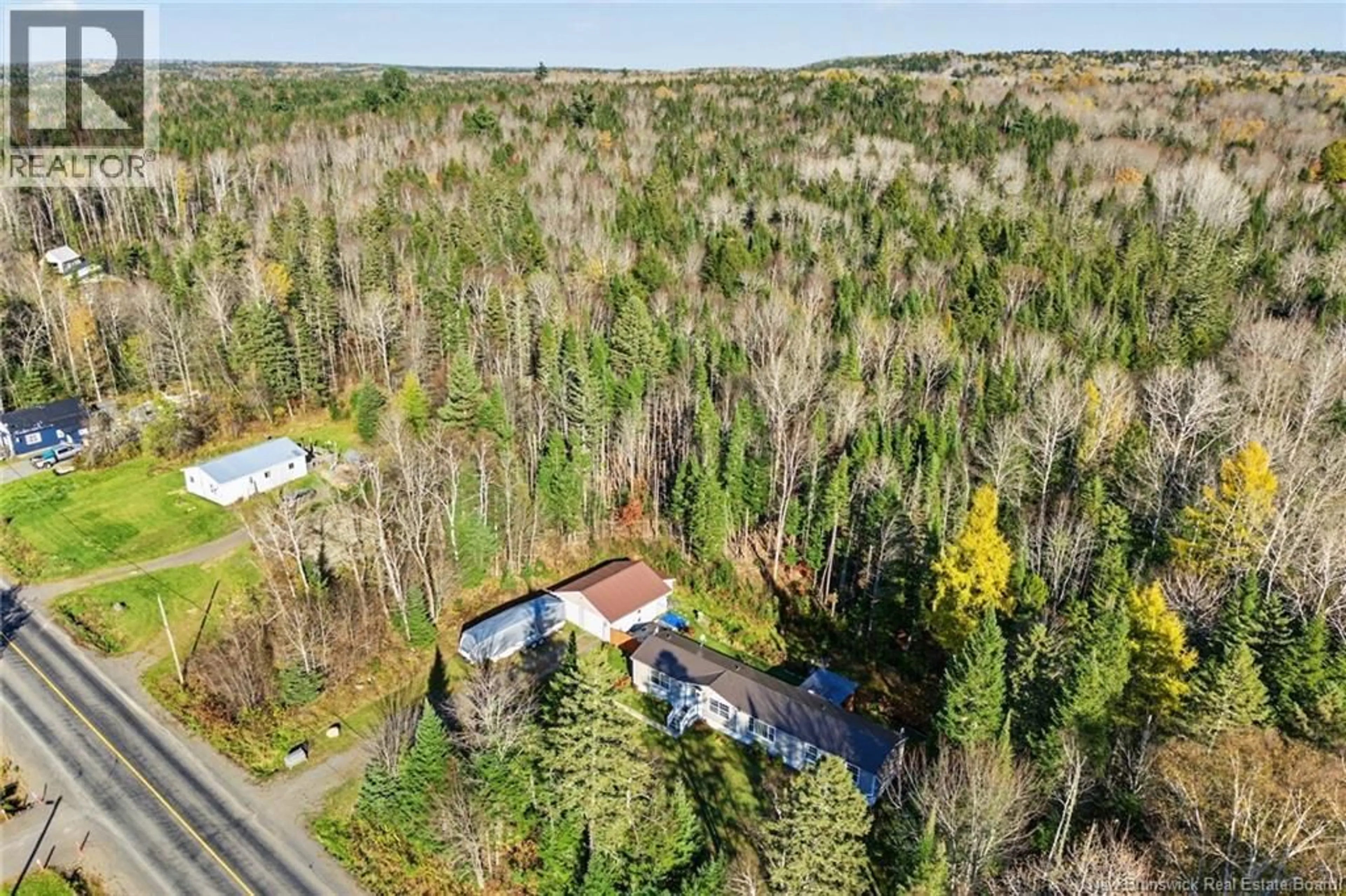 A pic from outside/outdoor area/front of a property/back of a property/a pic from drone, forest/trees view for 1072 RTE 628, Taymouth New Brunswick E6C2B7